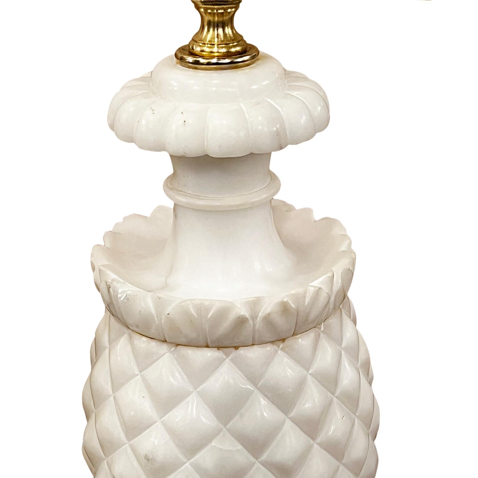 Pair of Italian circa 1950's carved alabaster lamps in the shape of pineapples.

Measurements:
Height of body: 18