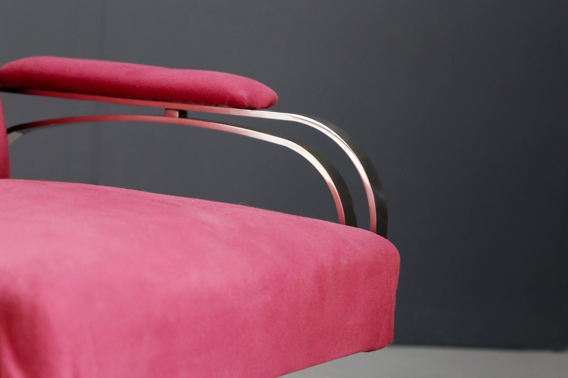 Pair of armchairs model Micaela designed by Gianni Moscatelli for Formanova manufacture in 1970s.
The pair of armchairs is with the original fabric in perfect condition. The fabric is a fuchsia velvet. The steel frame is in excellent condition with