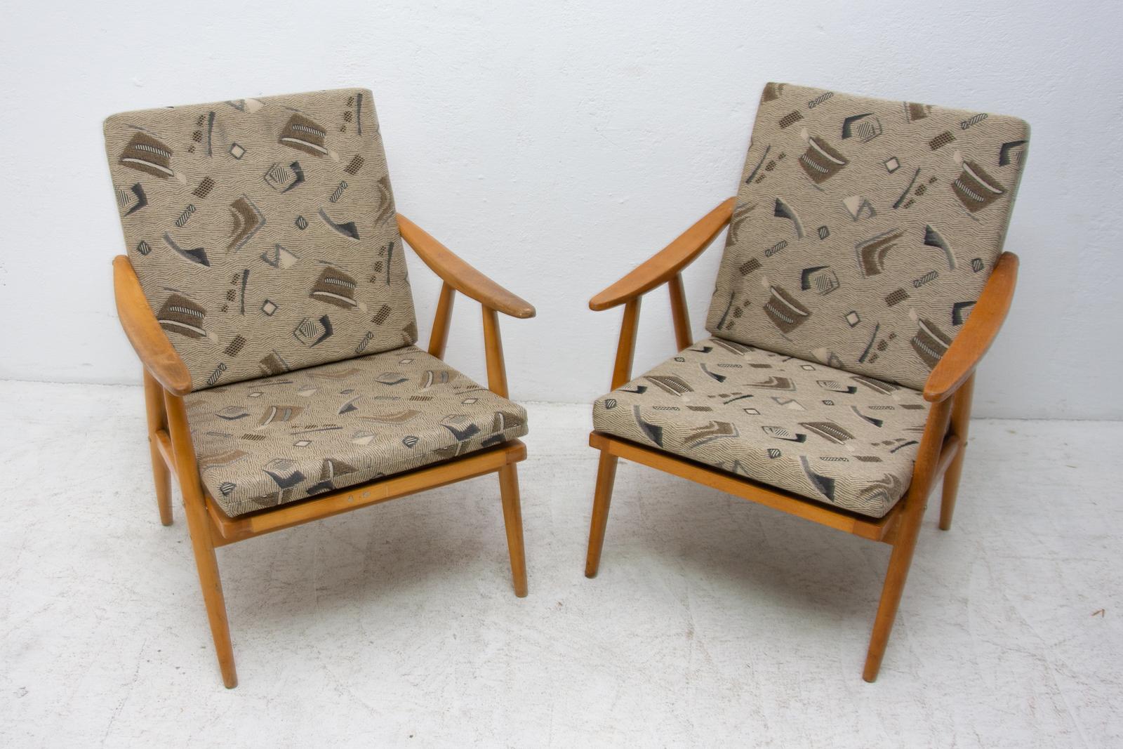 These armchairs were designed by Jaroslav Šmídek for TON company and made in the former Czechoslovakia in the 1970s. They are made of beechwood.

The chairs are stable and comfortable, the springs under the seat are firm and stable.

The chairs