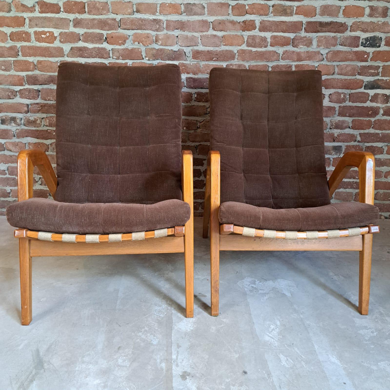 Pair of Midcentury Armchairs in Oak by Jan Vanek, Czechoslovakia, 1950

Additional information:
Country of Manufacture – Czechoslovakia
Design Period – 1950
Production Period – 1950
Style – Midcentury
Designer –Jan Vanek
Material – Oak wood
Color –