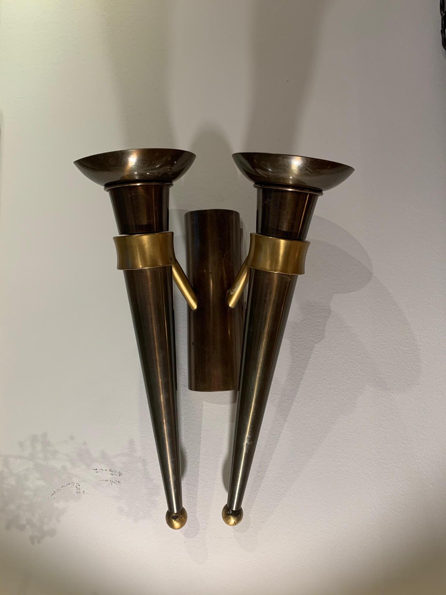 Pair of wall torches in the form of a double torch, in patinated and enameled bronze, two pairs are available, an electrical installation renewed.