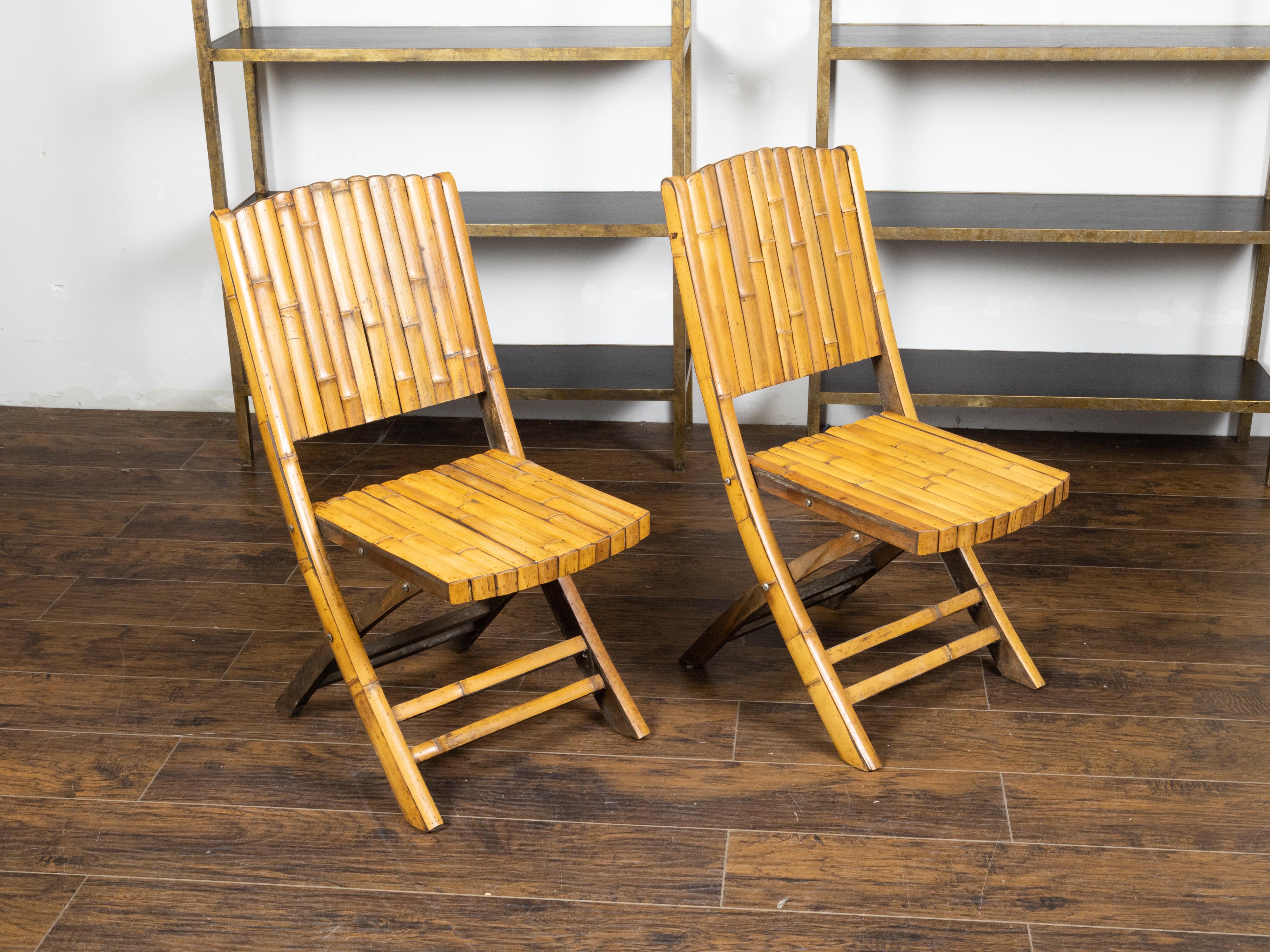 20th Century Pair of Midcentury Bamboo Folding Chairs with Slatted Design and Light Patina For Sale