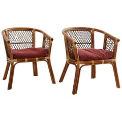Paire de chaises tonneau en bambou et rotin du milieu du siècle dernier