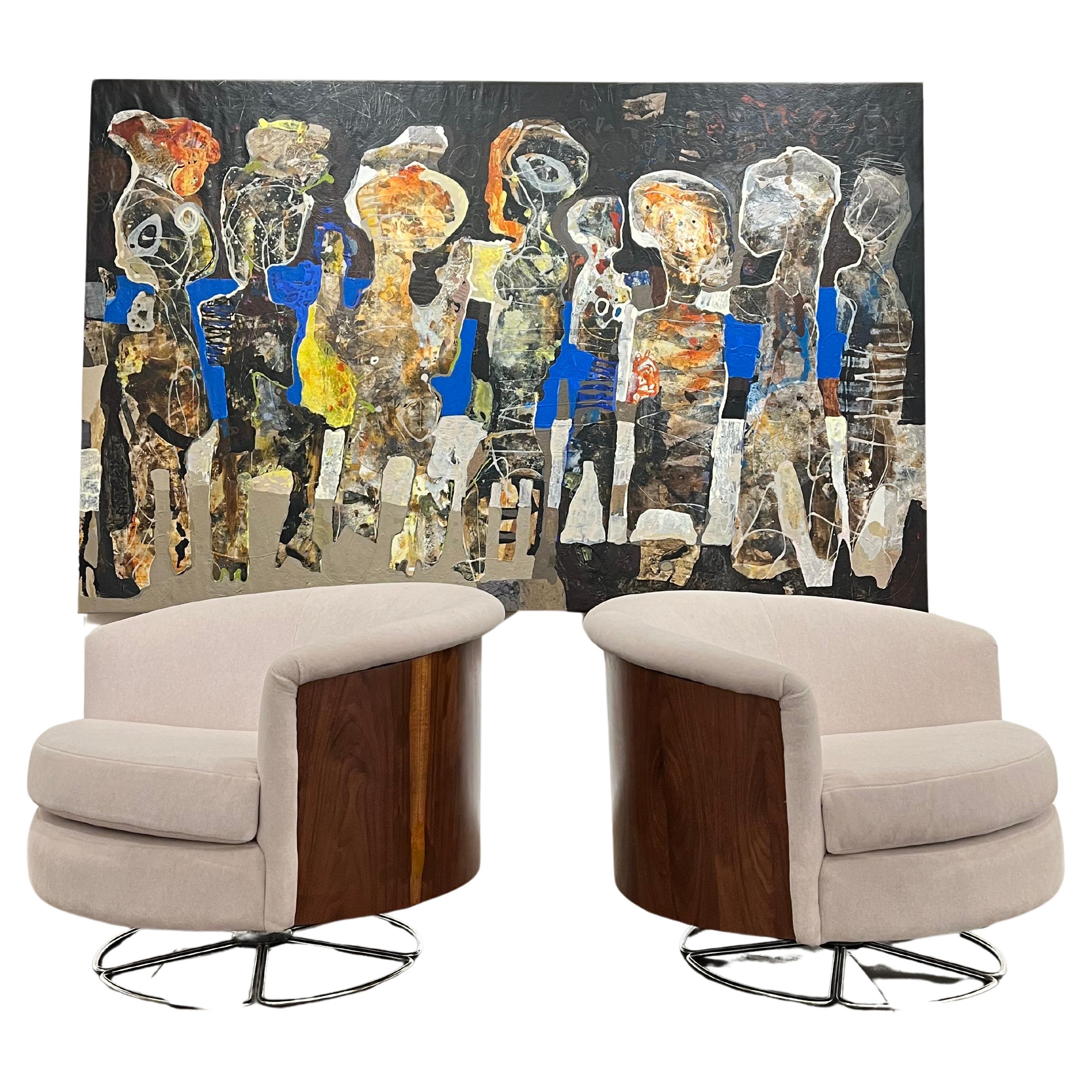 Paire de chaises pivotantes en forme de tonneau du milieu du siècle par Selig en vente