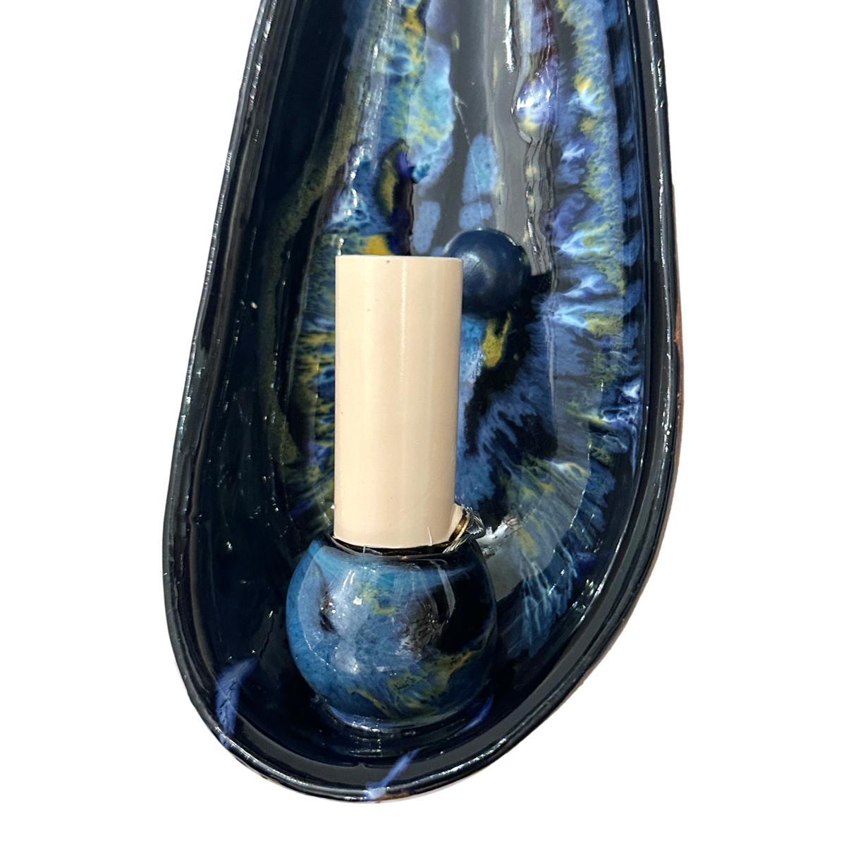 Pair of circa 1960's Portuguese blue porcelain single light sconces.

Measurements: 
Height: 9