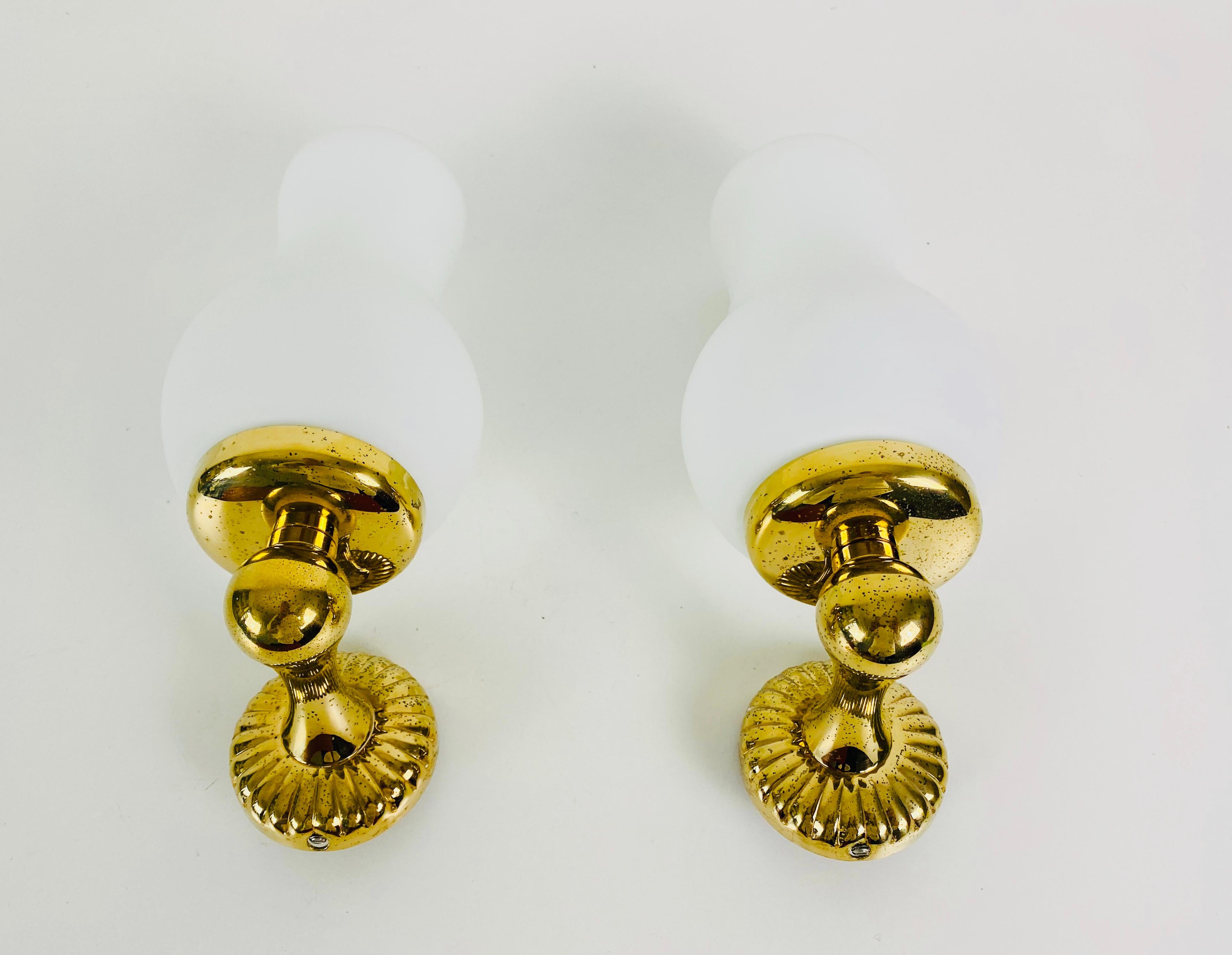 Italian Pair of Midcentury Brass and Opaline Glass Wall Lamps, Italy, 1960s For Sale