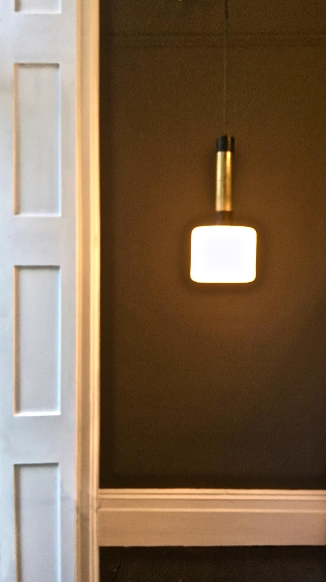 Italian Pair of Midcentury Brass and Satin Glass Pendant Lights Attributed to Stilnovo