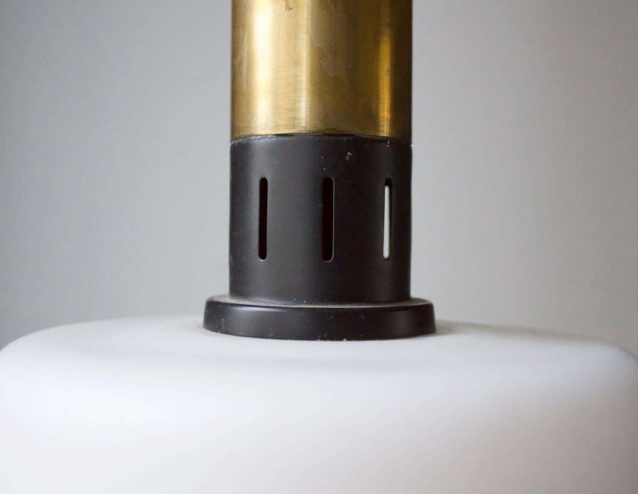 20th Century Pair of Midcentury Brass and Satin Glass Pendant Lights Attributed to Stilnovo