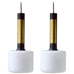 Pair of Midcentury Brass and Satin Glass Pendant Lights Attributed to Stilnovo