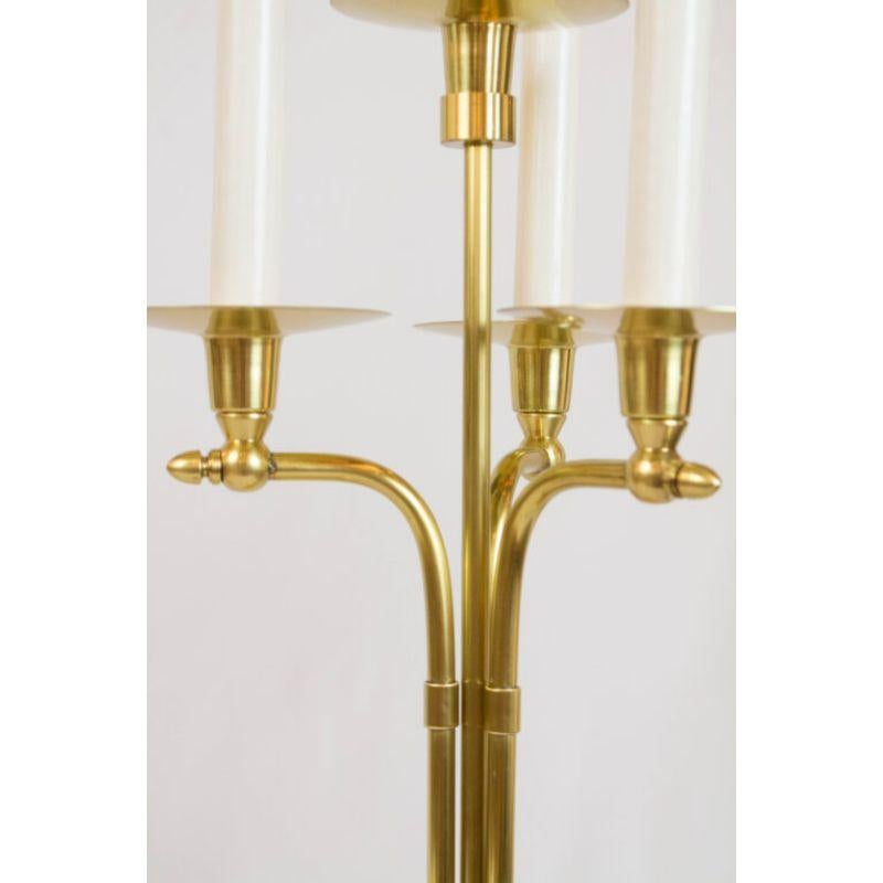 Pair of brass candelabra, midcentury modern design. Four Lights each. Hand polished and rewired withe new sockets and white candlecovers. C. 1960

Dimensions: 
Height: 23
Width (Diameter): 10.