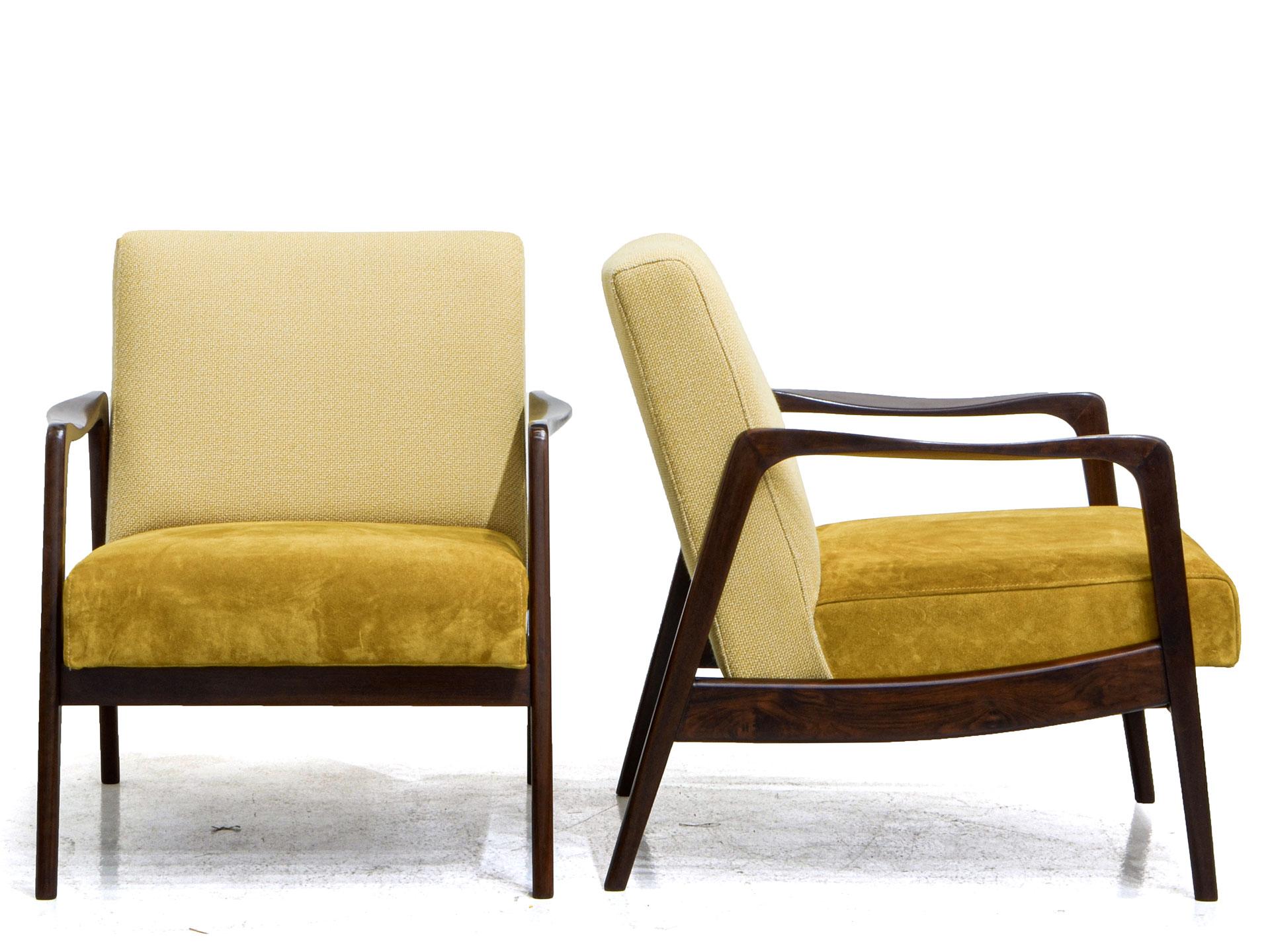 This beautiful pair of armchairs is definitely an eyecatcher. The design of the Jacaranda rosewood structure combines beautifully the organic shape and the geometric lines. It is a unique shape that distinguishes itself in any interior. 

Lucio