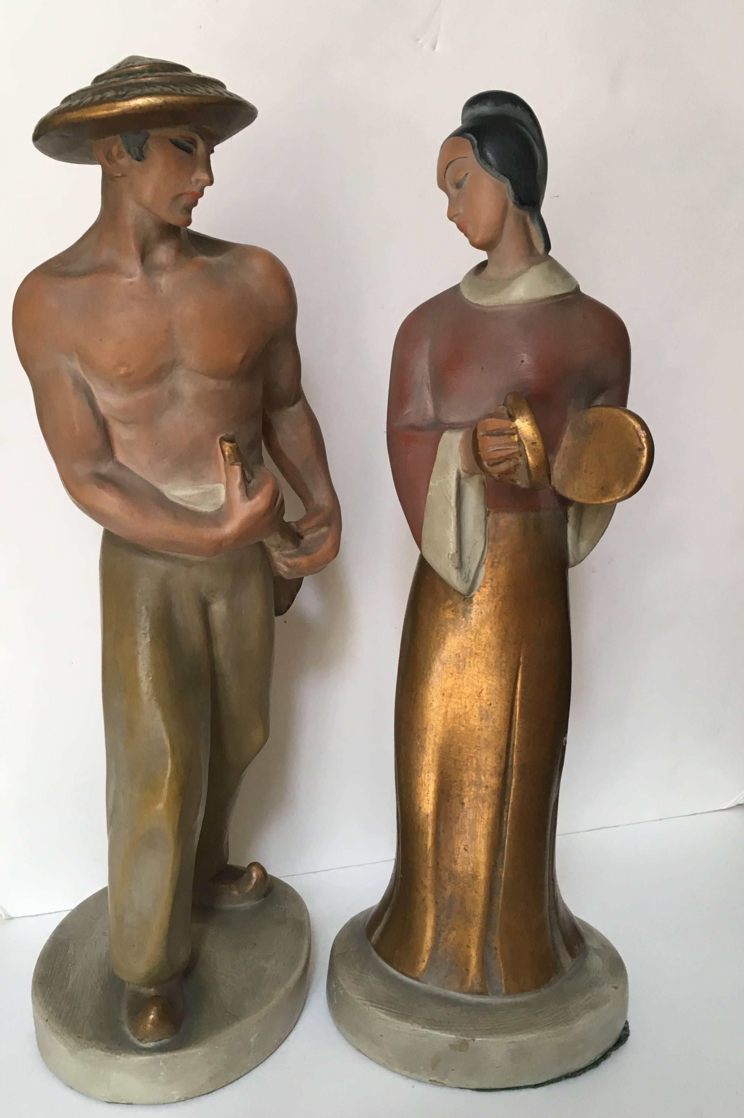 A pair of midcentury ceramic figurines, circa 1950, reflecting an Art Deco orientalist style, turning to the midcentury.
Dimension: 16 cm large, by 13 cm deep 43 cm high
the price is for each figures, sold separately or in a set.
 