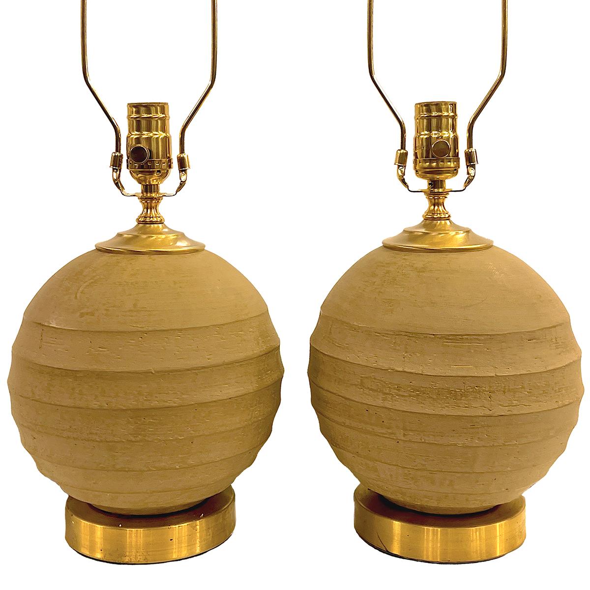 Pair of circa 1970's Italian ceramic table lamps with gilt bases.

Measurements:
Height of body: 10
