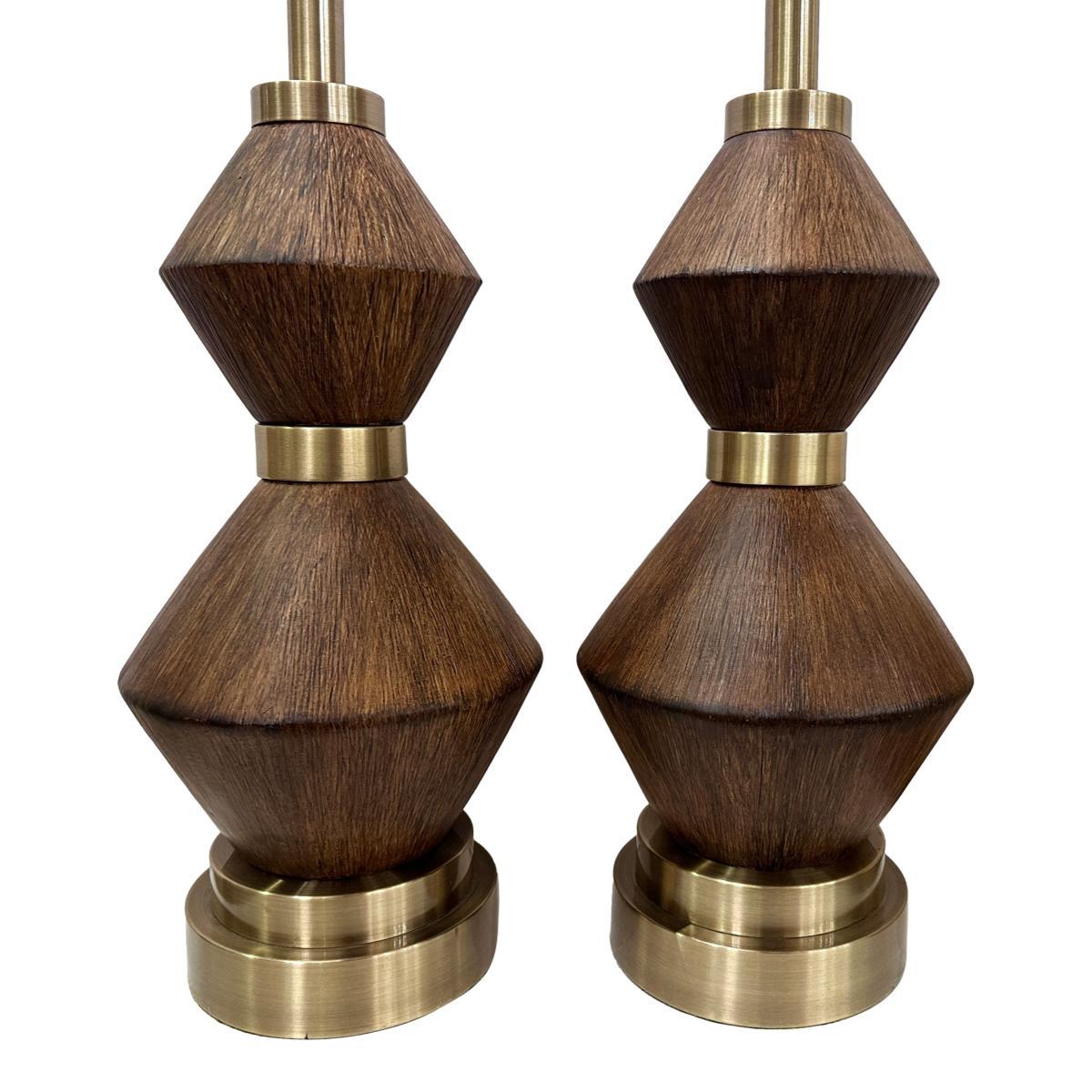A pair of circa 1960's Italian faux wood ceramic table lamps.

Measurements:
Height of body: 20