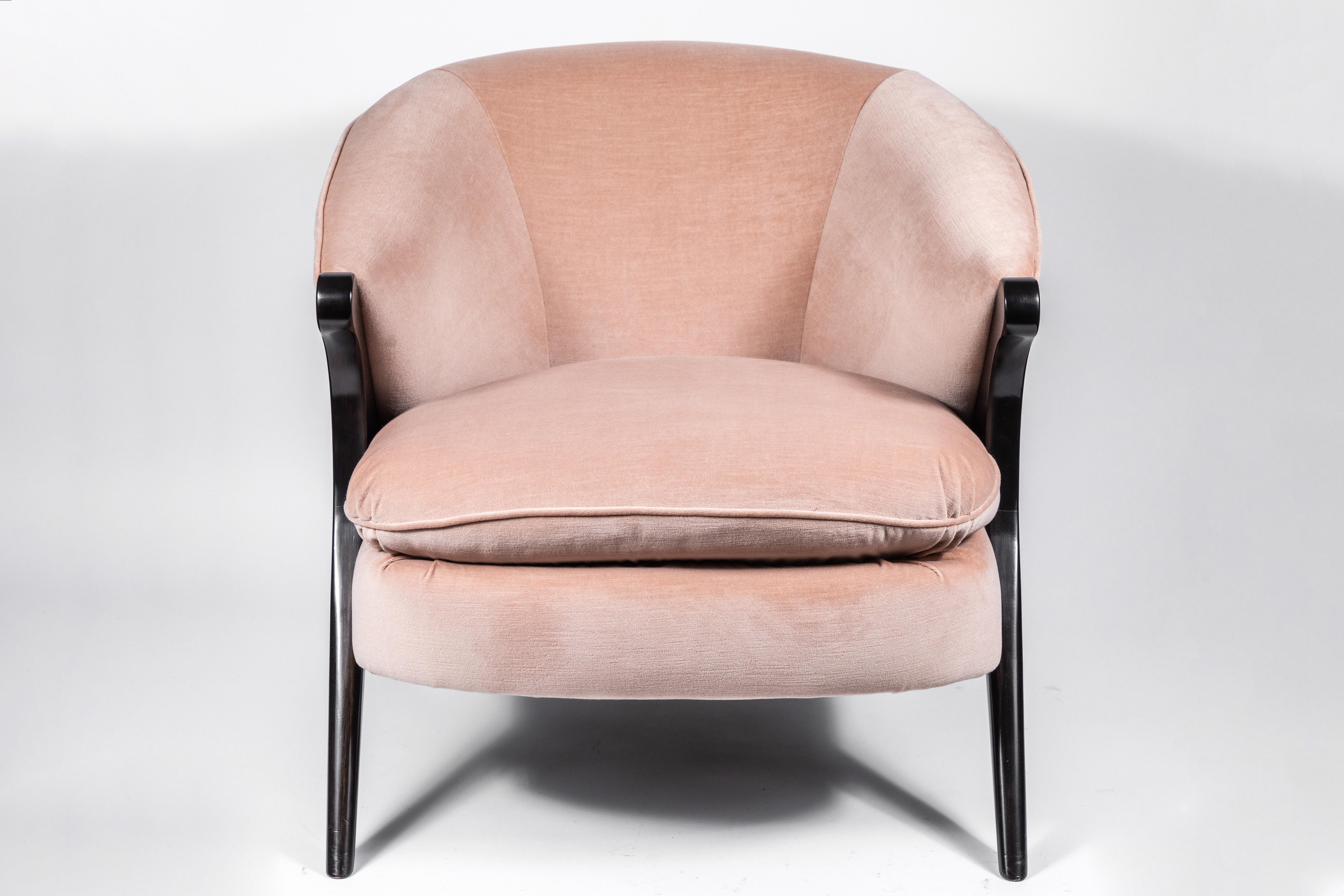 Fabulous pair of sculptural chairs with curved backs, scissor legs and arms in the style of Karpen, circa 1970s. Chairs are mint restored, with refinished walnut legs and newly upholstered in a blush pink velvet.