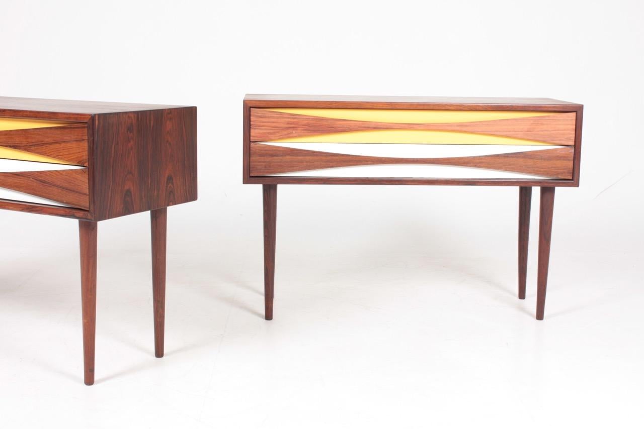 Pair of chest of drawers in rosewood. Works well as nightstands or side tables. Designed by Arne Vodder in the 1960s. Great condition.