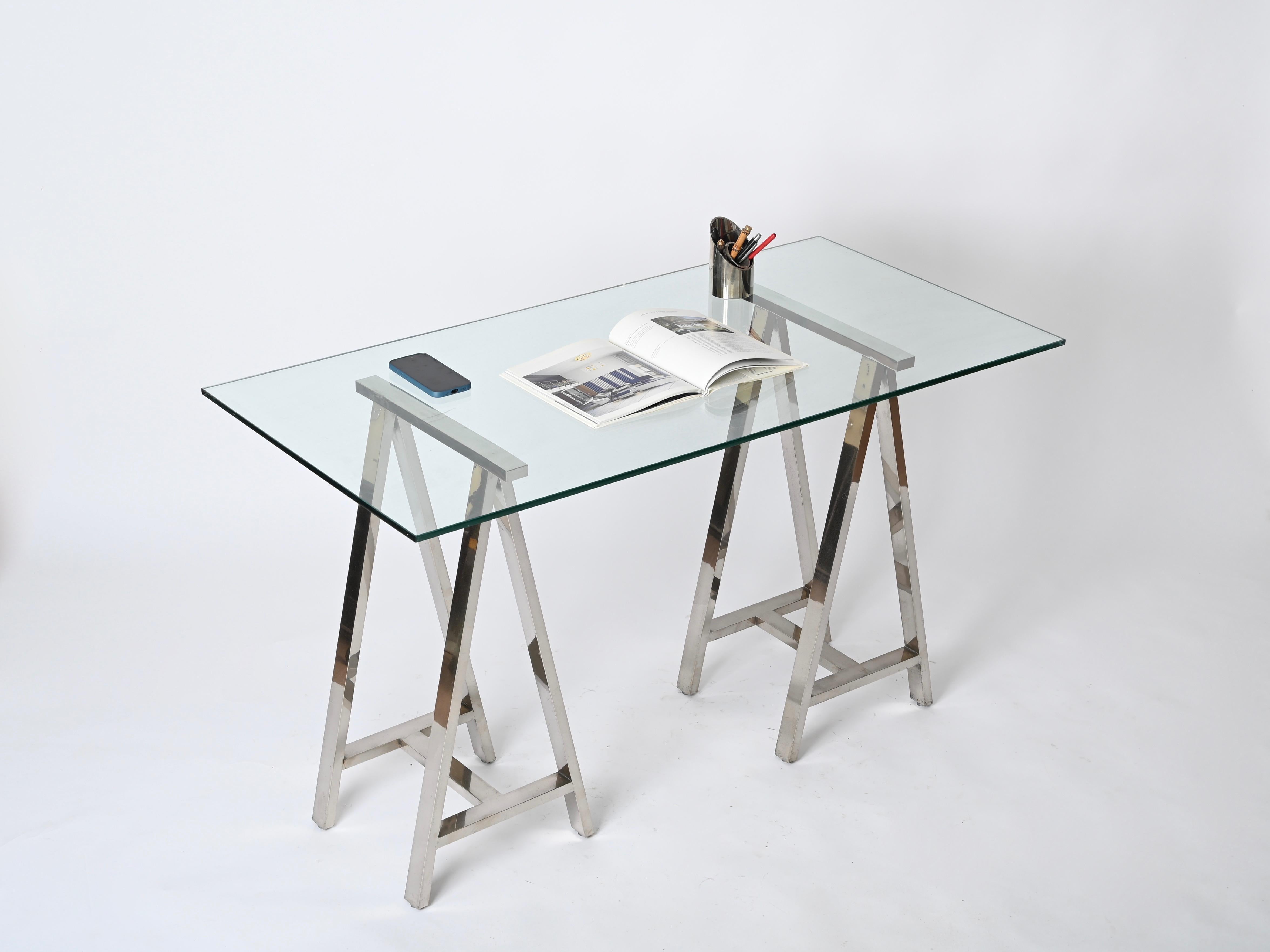 Gorgeous pair of midcentury trestles fully made in chromed steel. These incredibly stylish trestles were designed in Italy after Milo Baughman during the 1970s.

These versatile trestles are perfect for creating a table, a desk or a console table.