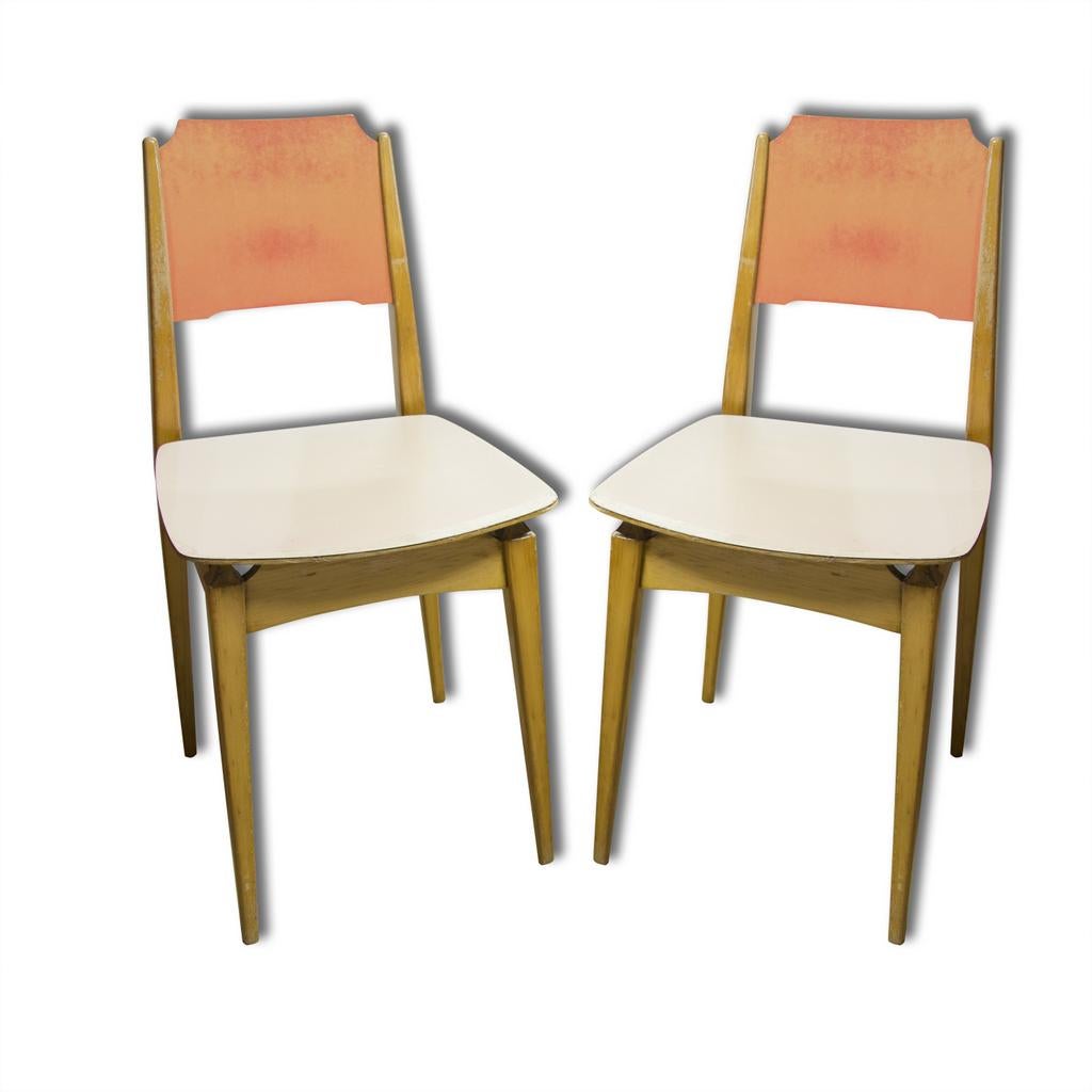 A pair of midcentury chairs, made in Czechoslovakia, associated with Brussels period after EXPO 58. Material: varnished plastic seat, beechwood. In very good original condition. Price is for the pair.




 