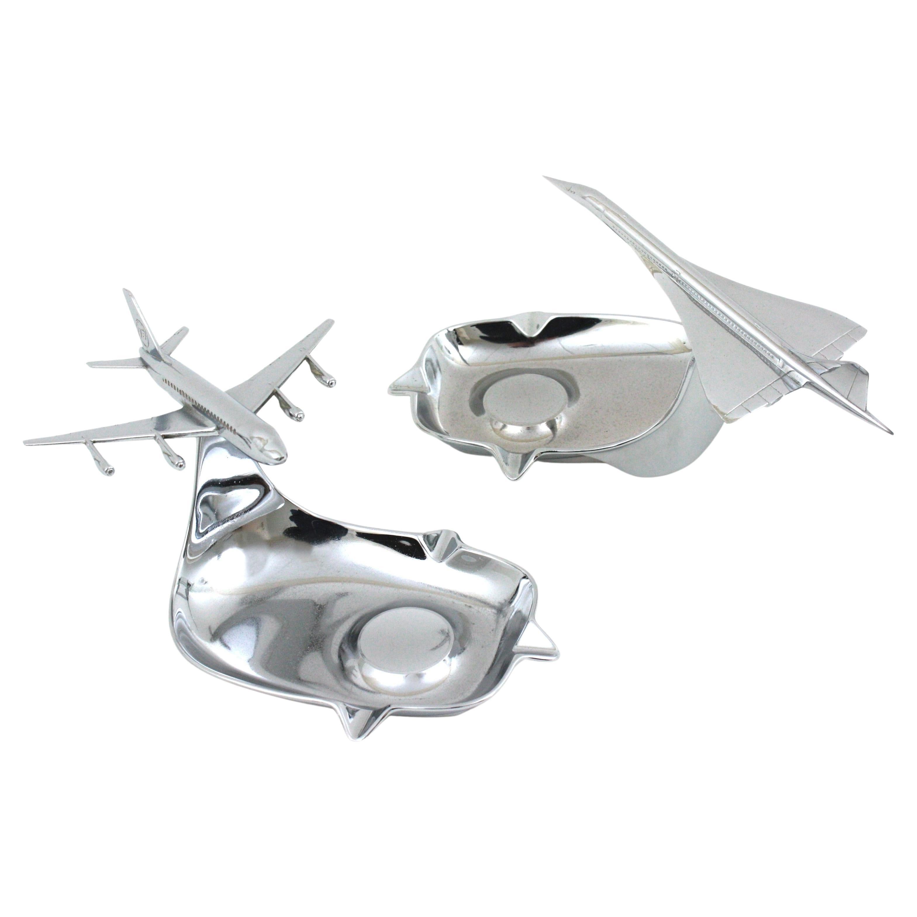 Plated Pair of Midcentury Concorde & DC-8 Desk Model Airplane Chromed Ashtrays For Sale