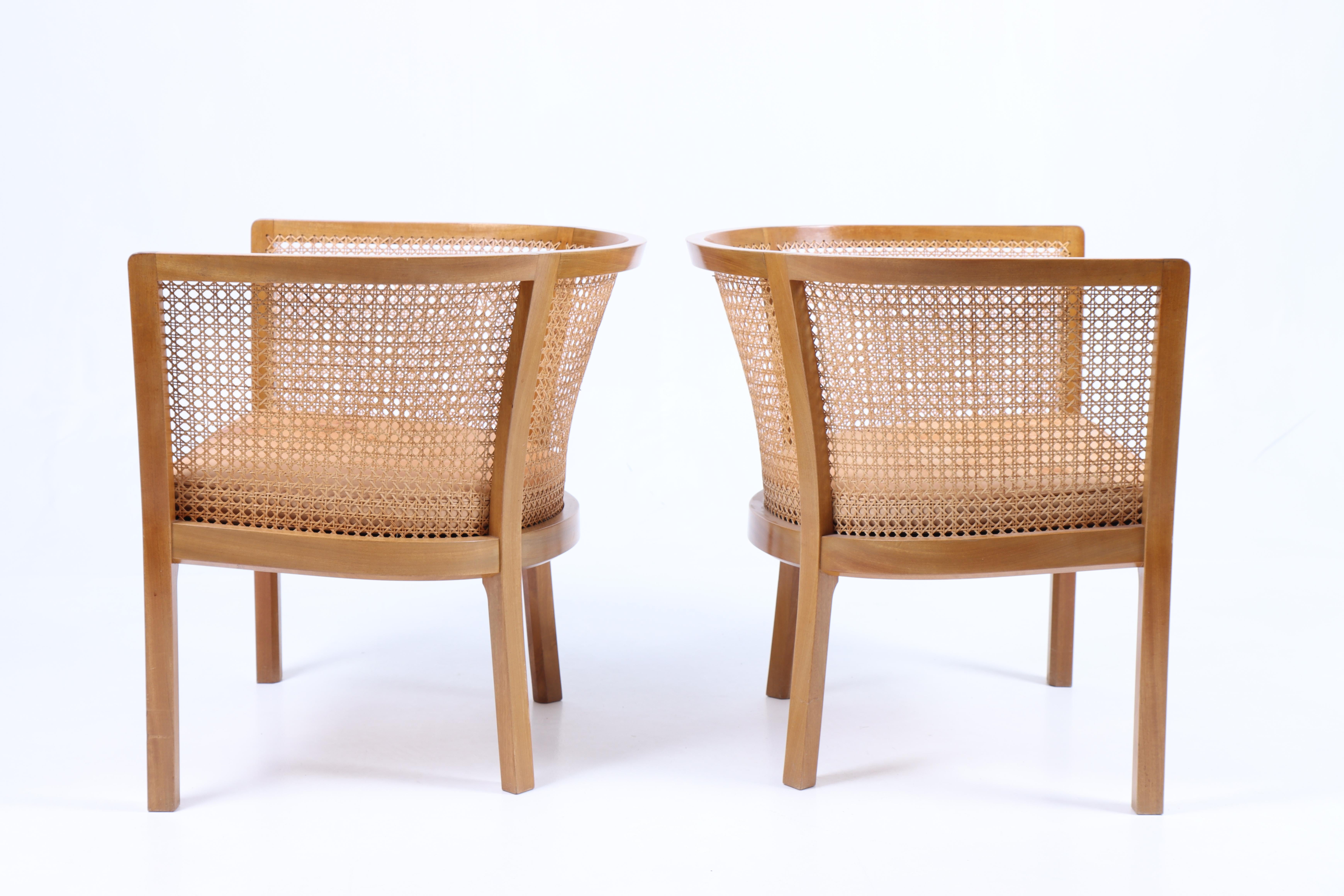Late 20th Century Pair of Midcentury Danish Lounge Chairs by in Mahogany and Patinated Leather