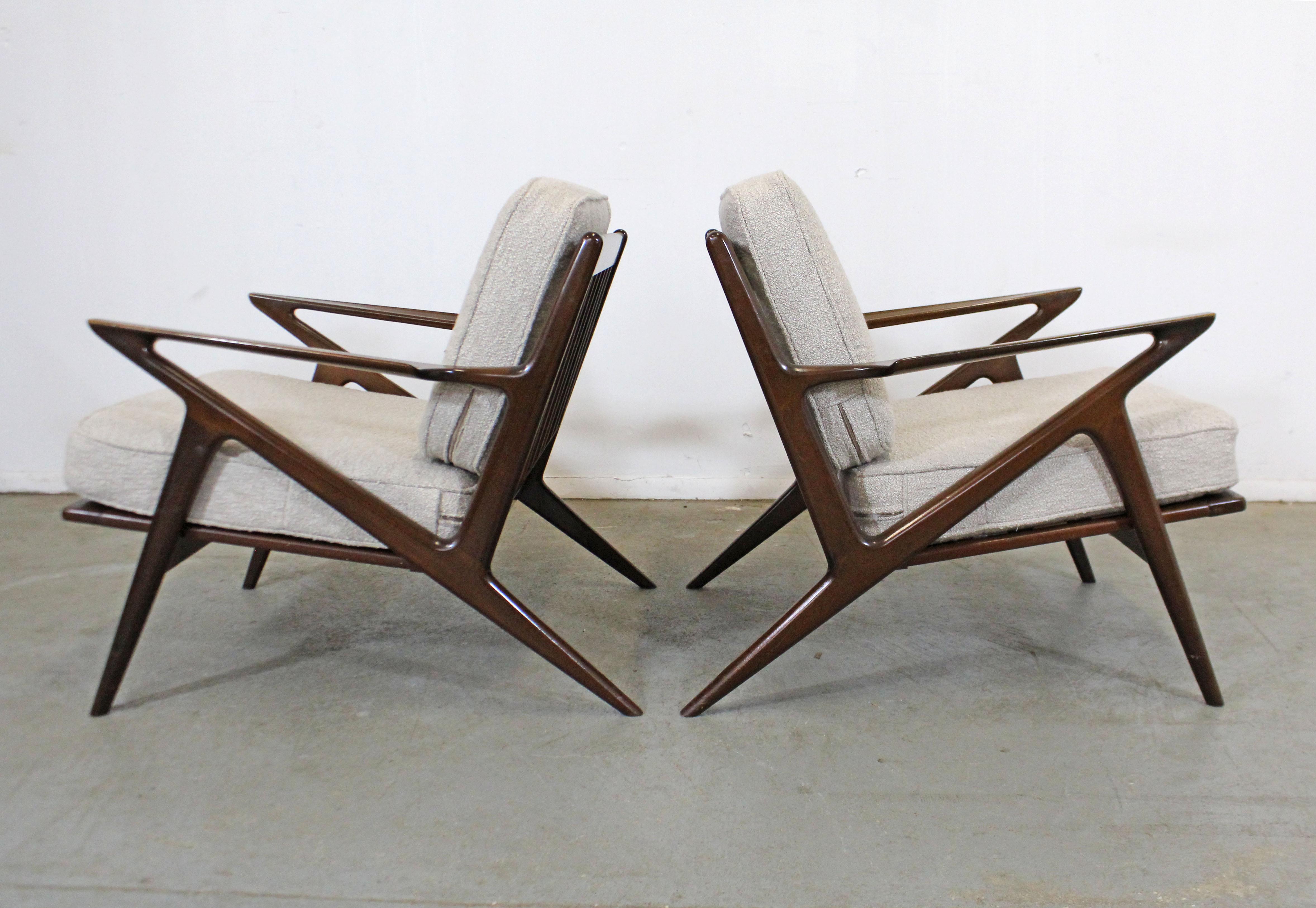 This set includes an iconic pair of authentic Mid-Century Modern 