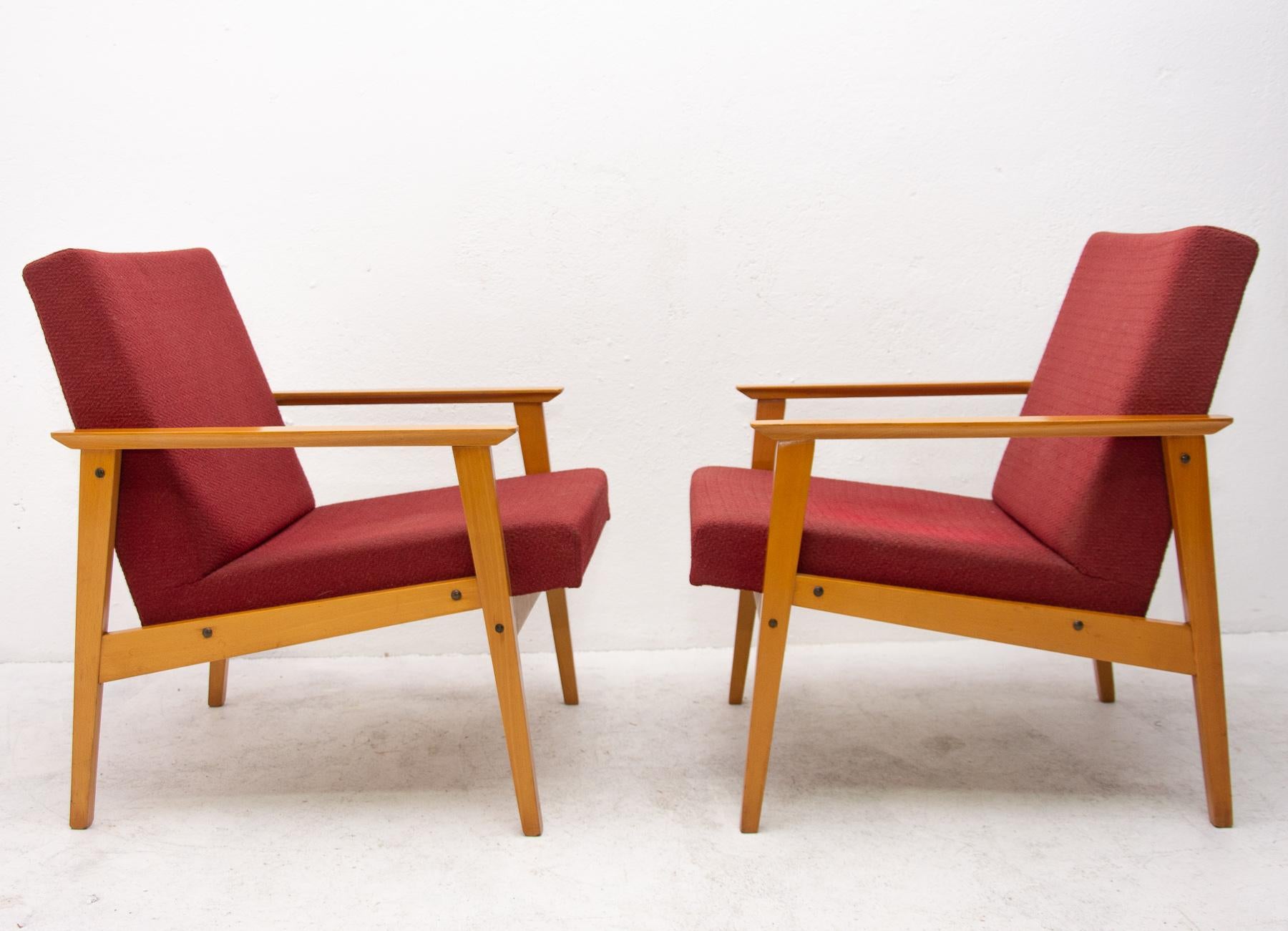 A pair of armchairs in Danish style, made in the former Czechoslovakia in the 1960s. The chairs were produced by TON Bystrice pod Hostýnem company( Thonet successor in Czechoslovakia) The structure is made of beech wood and the chairs has original