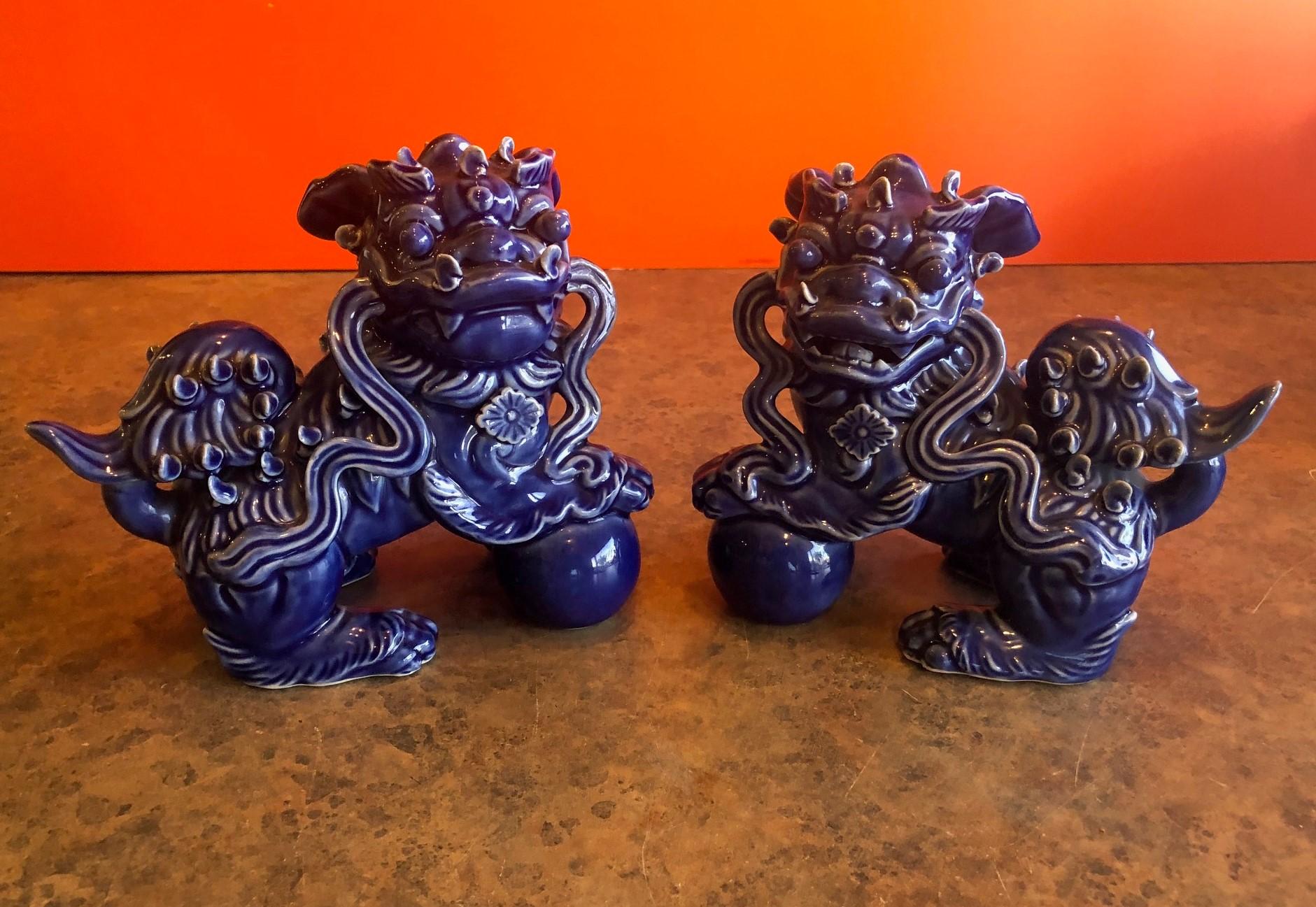 Pair of Midcentury Dark Blue Chinese Ceramic Foo Dogs In Good Condition In San Diego, CA