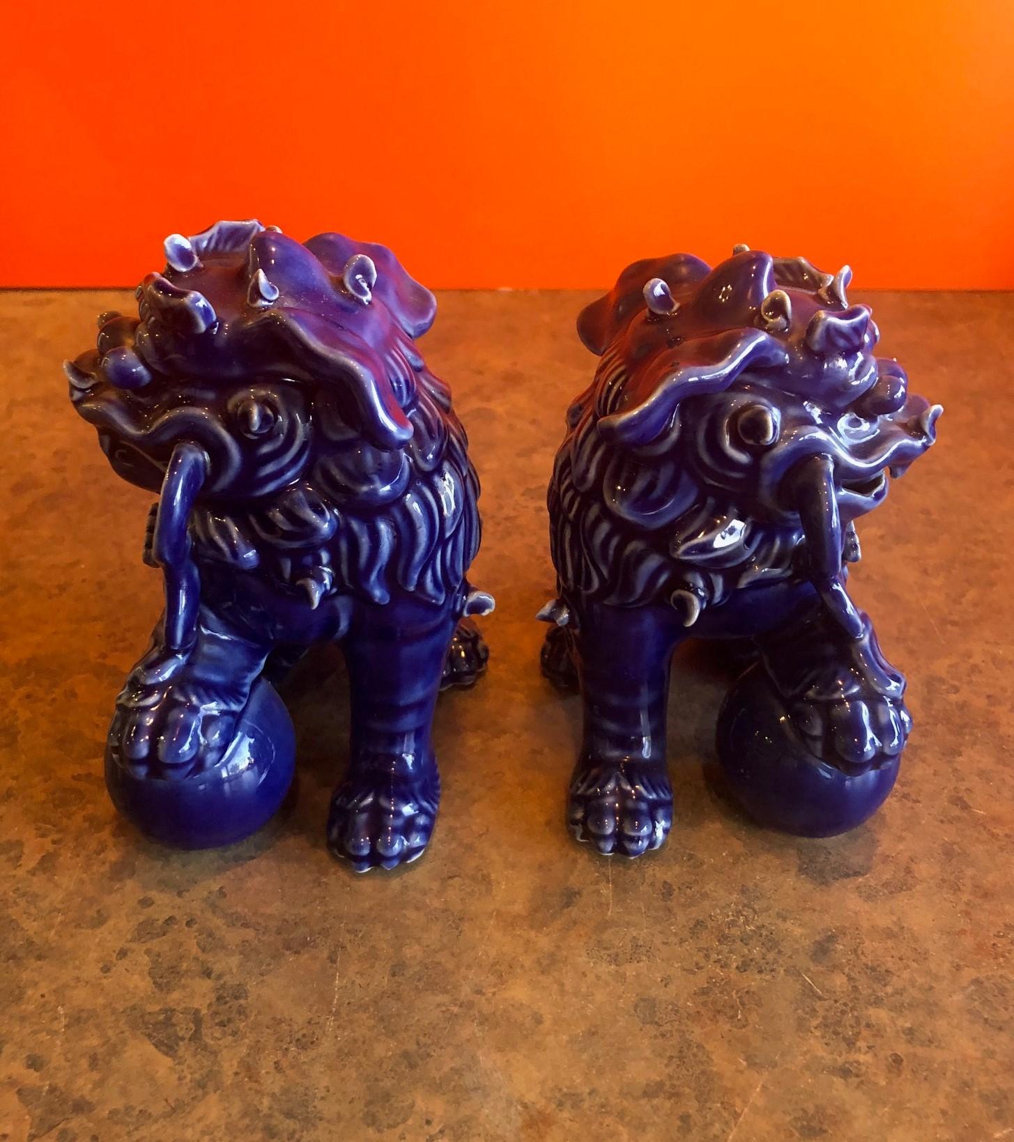 20th Century Pair of Midcentury Dark Blue Chinese Ceramic Foo Dogs