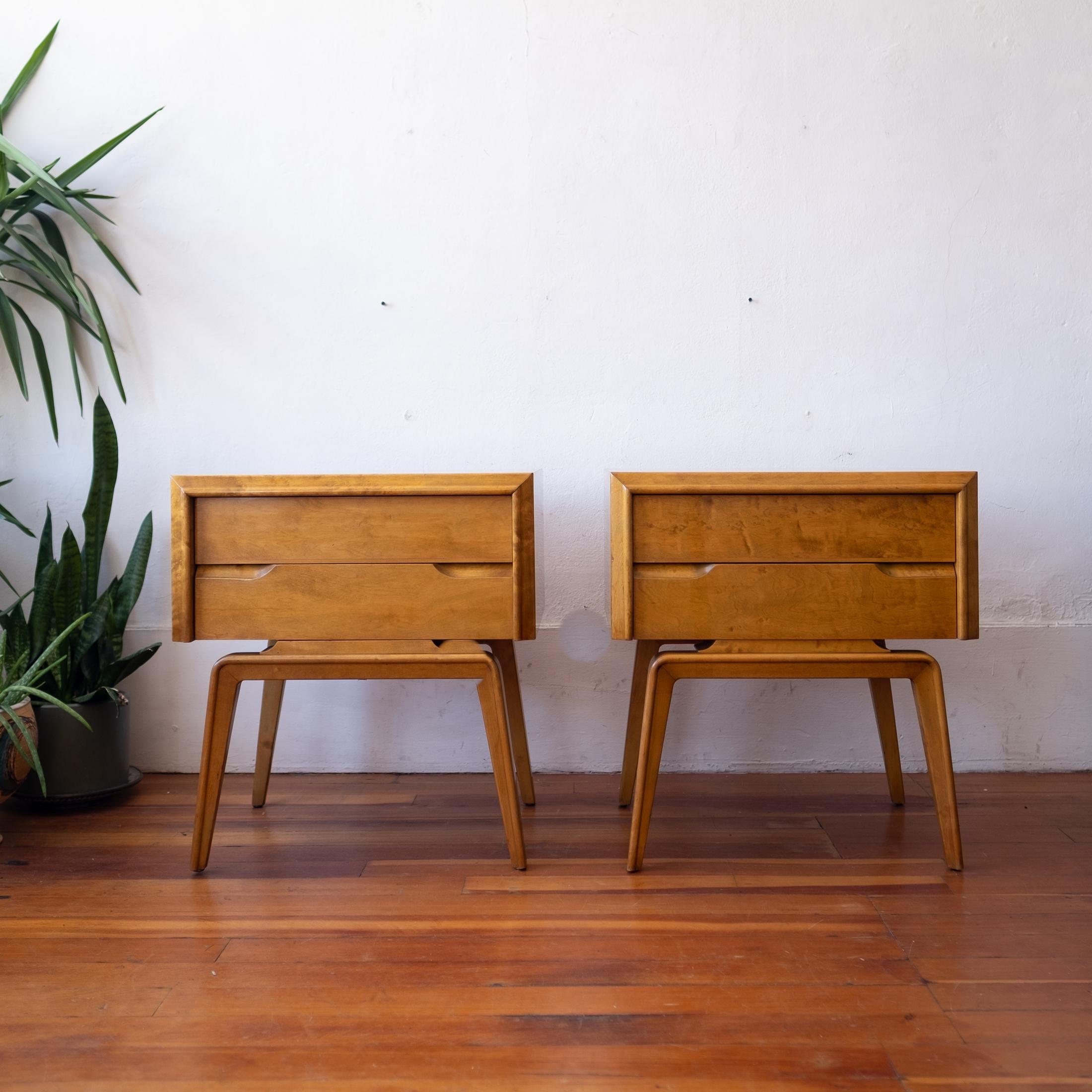 Pair of two drawer nightstands or end tables by Edmond Spence. Beautiful figured maple. Solid wood construction. Finished backs.Original finish. Sweden, 1950s. 

Edmond J. Spence (1911-1986) was born in Montreal and followed several generations of