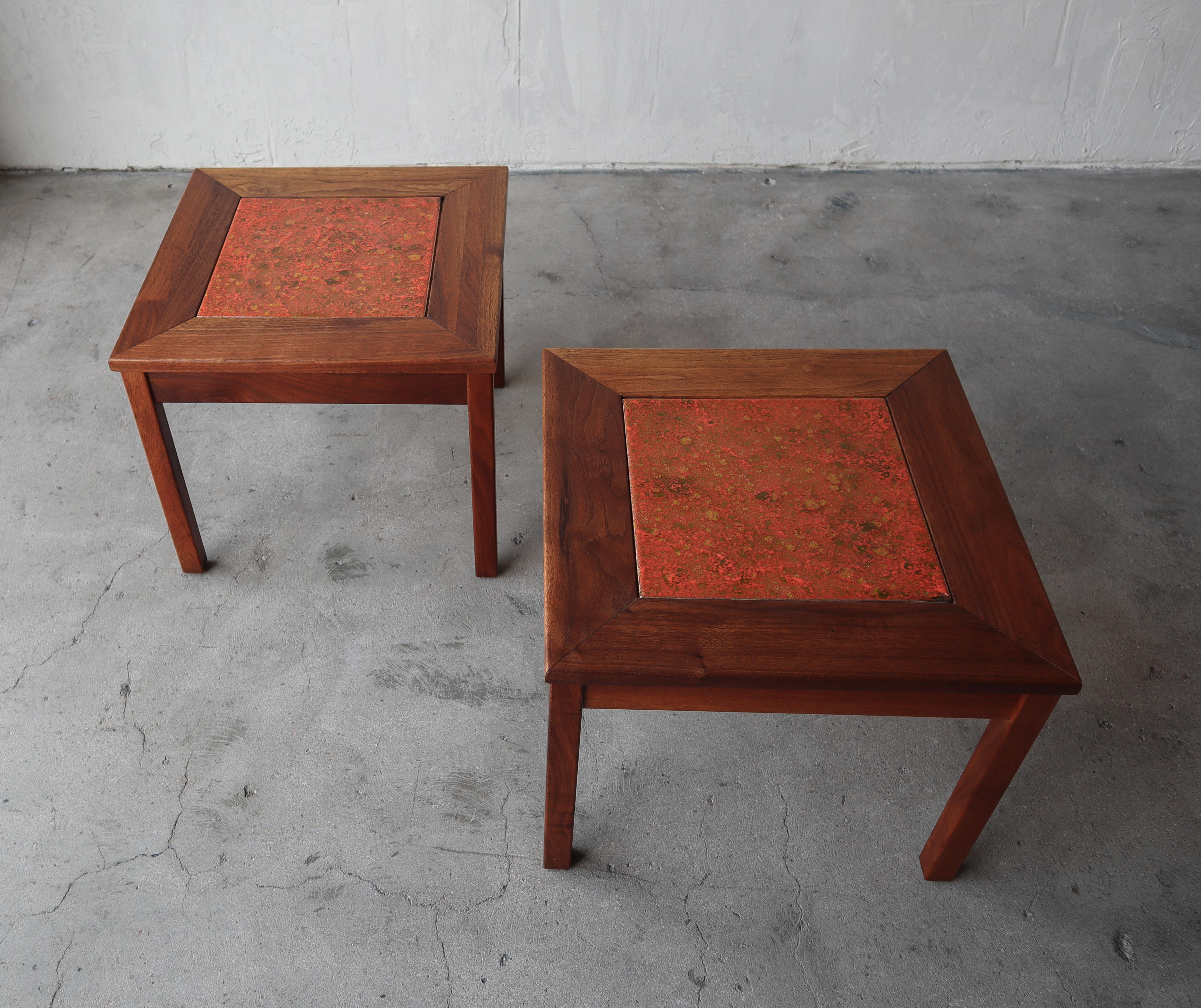 Nice set of authentic midcentury walnut side tables with enameled copper inlay by Brown Saltman. Fun, classic pieces.

Tables are in great vintage condition overall. One chip to the enamel, please see last image.
