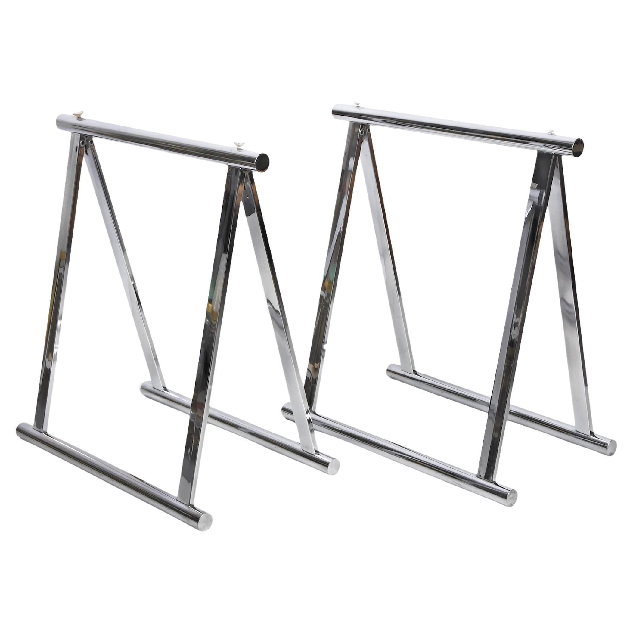 Wonderful pair of midcentury four-legs chromed steel trestles. These amazing pieces were designed in Italy after Milo Baughman during the 1970s.

These items are very versatile and will be perfect for creating a table or a desk because of their