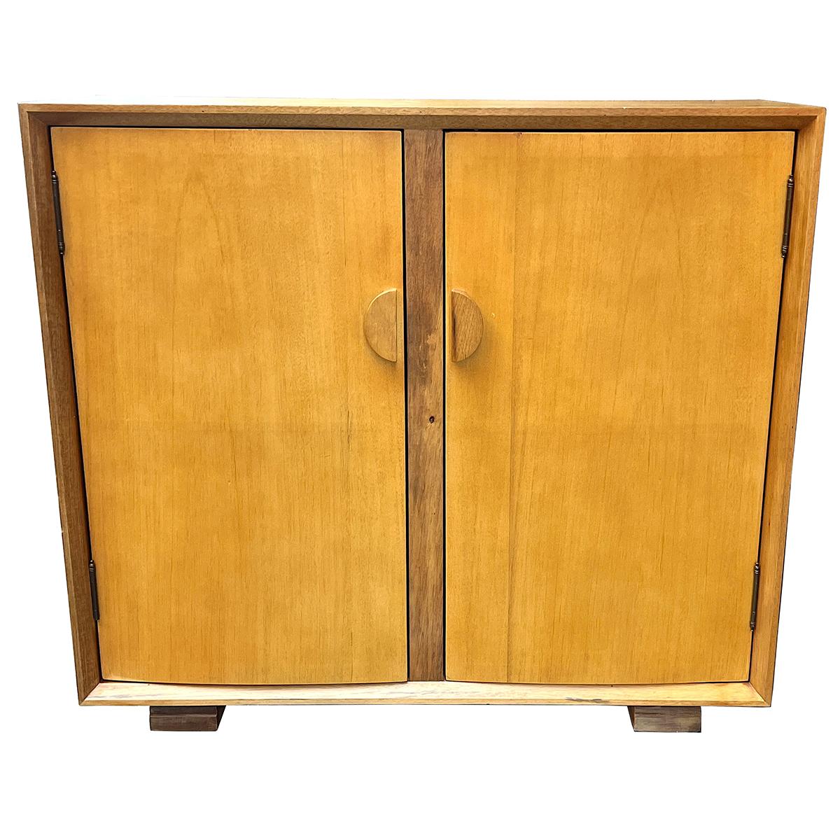 A pair of 1950's French modernist style cabinets with an interior shelf.

Mesurements:
Height: 35.5