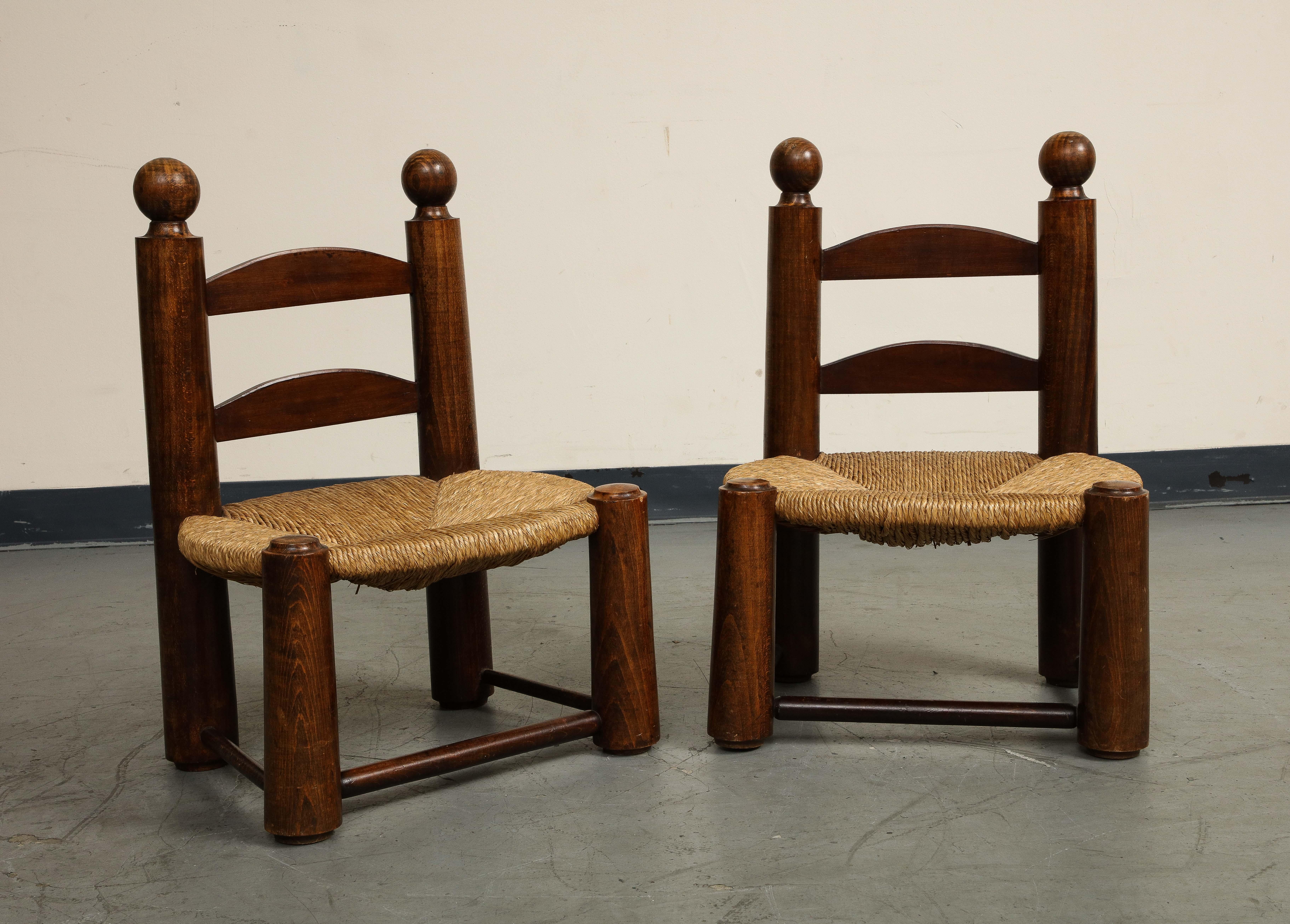 Pair of Midcentury French Oak and Rush Low Children's Chairs by Charles Dudouyt In Good Condition In Chicago, IL