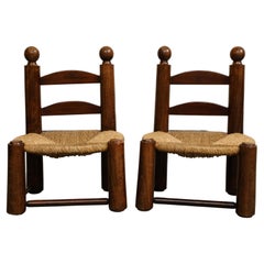 Pair of Midcentury French Oak and Rush Low Children's Chairs by Charles Dudouyt