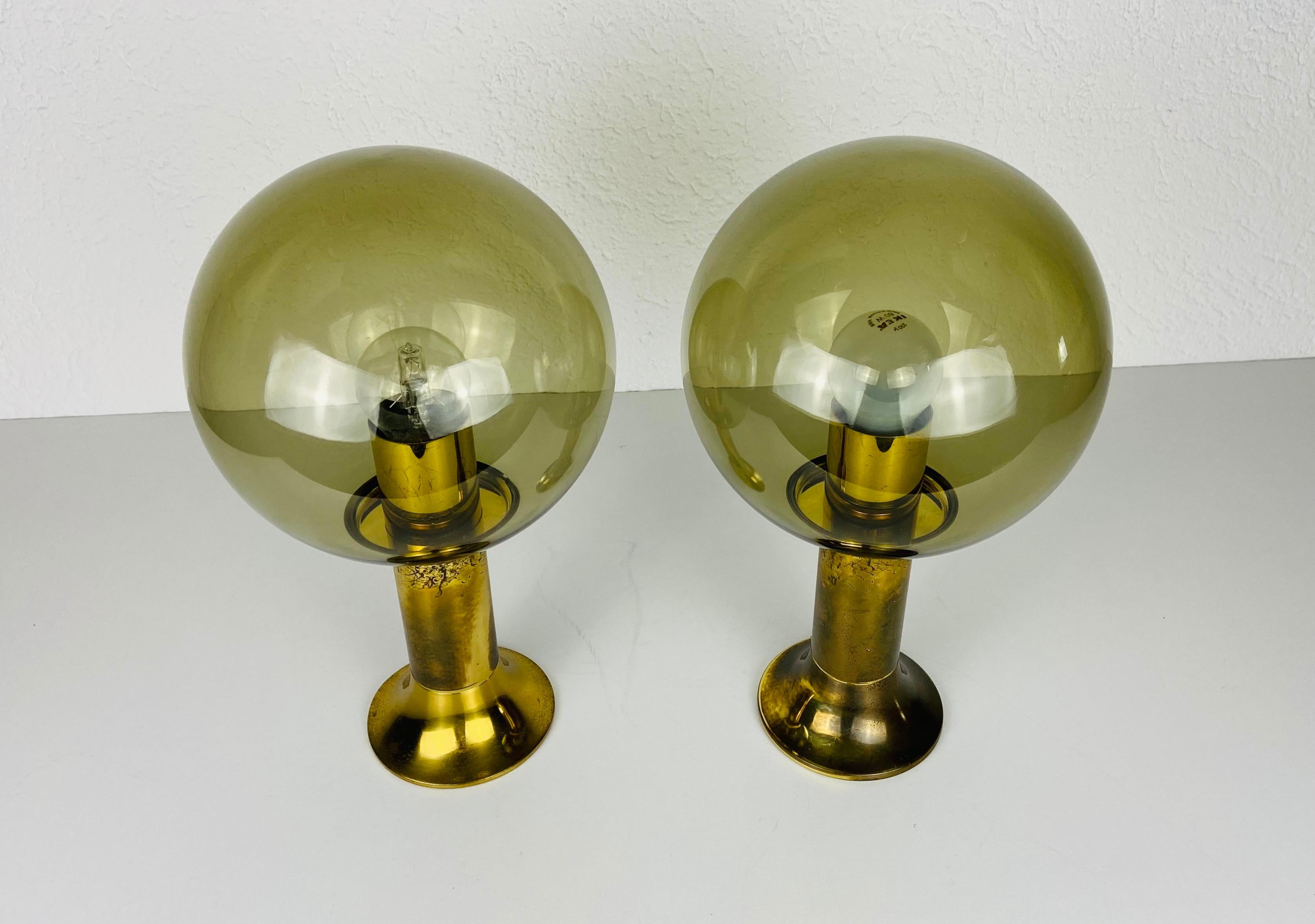 Pair of Mid-Century Modern flush mounts by Ott International made in the 1960s years. Brass base with glass shade.

The light requires one E27 (US E26) light bulb. Works with both 120/220 V. Very good vintage condition.

Free worldwide express