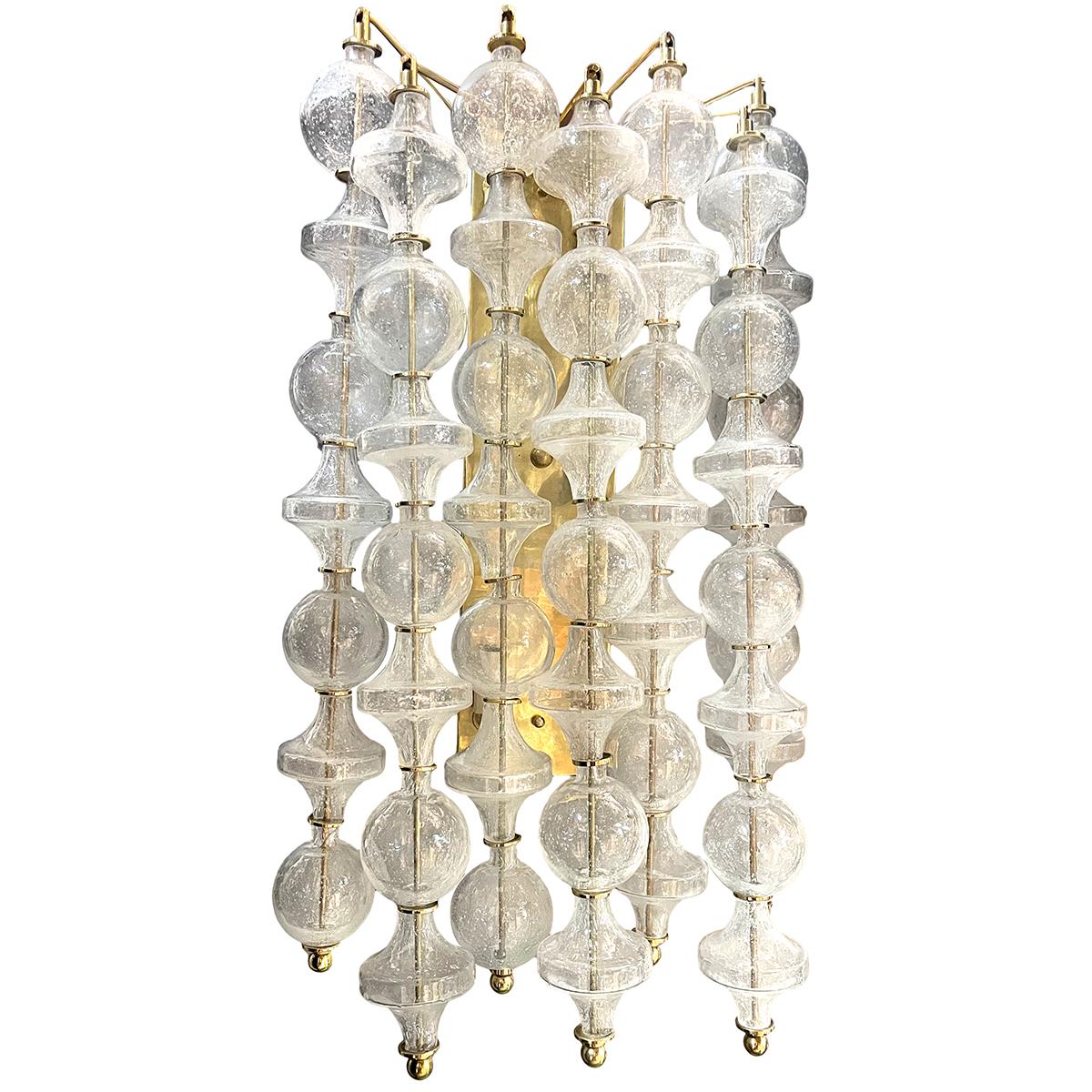 Pair of circa 1960's Italian blown glass sconces with four interior lights.

Measurements:
Height: 29