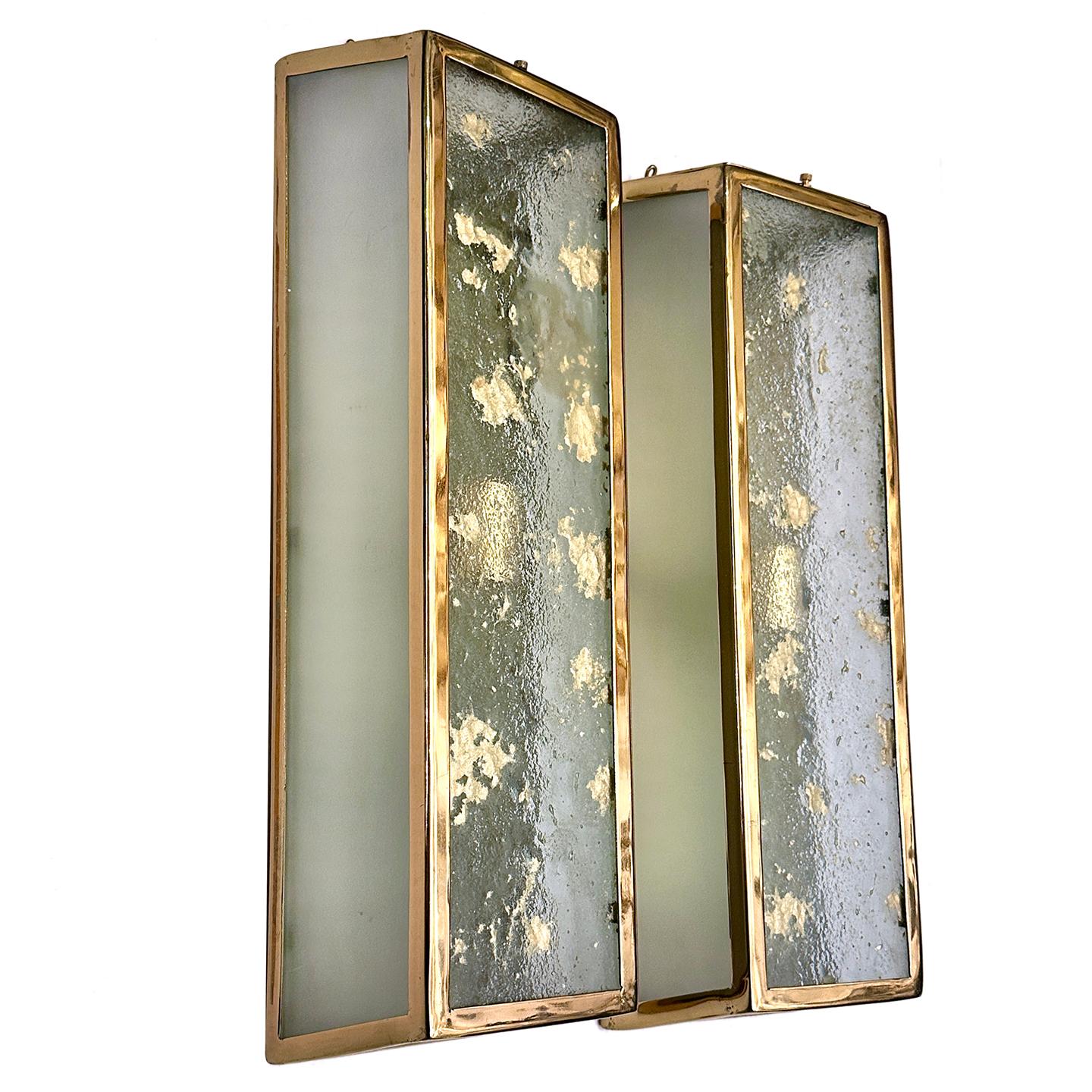 Pair of circa 1950's French gilt bronze sconces with art glass insets. 2 lights each.

Measurements:
Height: 21.5