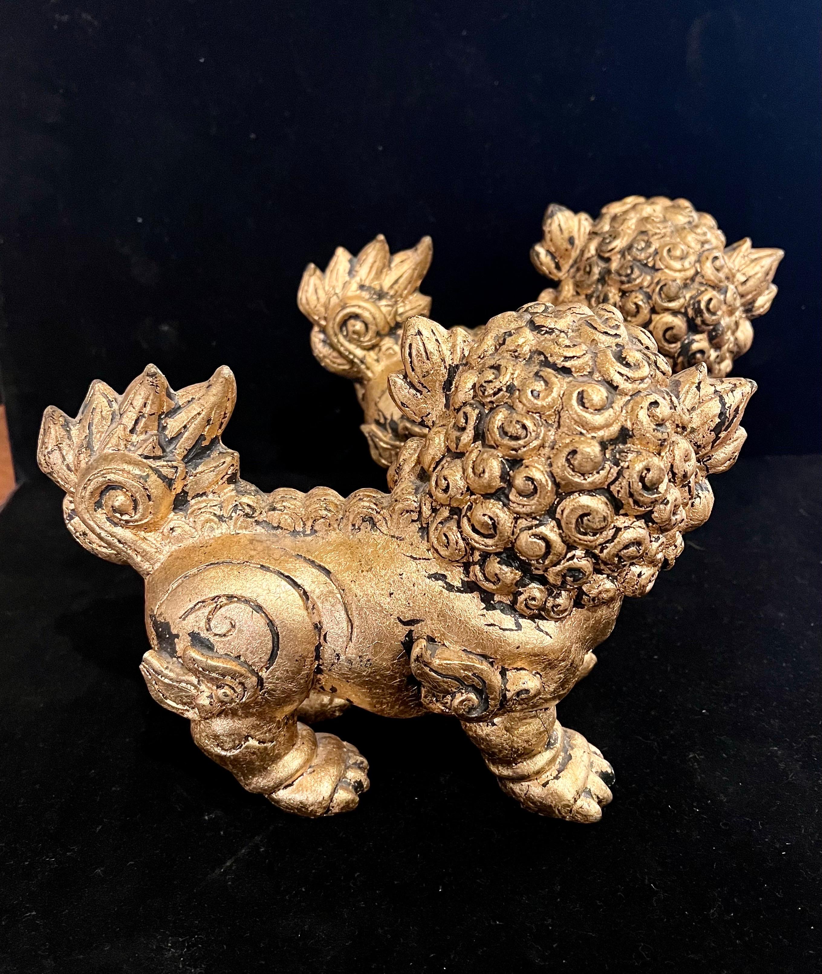 Chinese Pair of Mid-Century Gold Finish on Resin Foo Dogs or Bookends For Sale