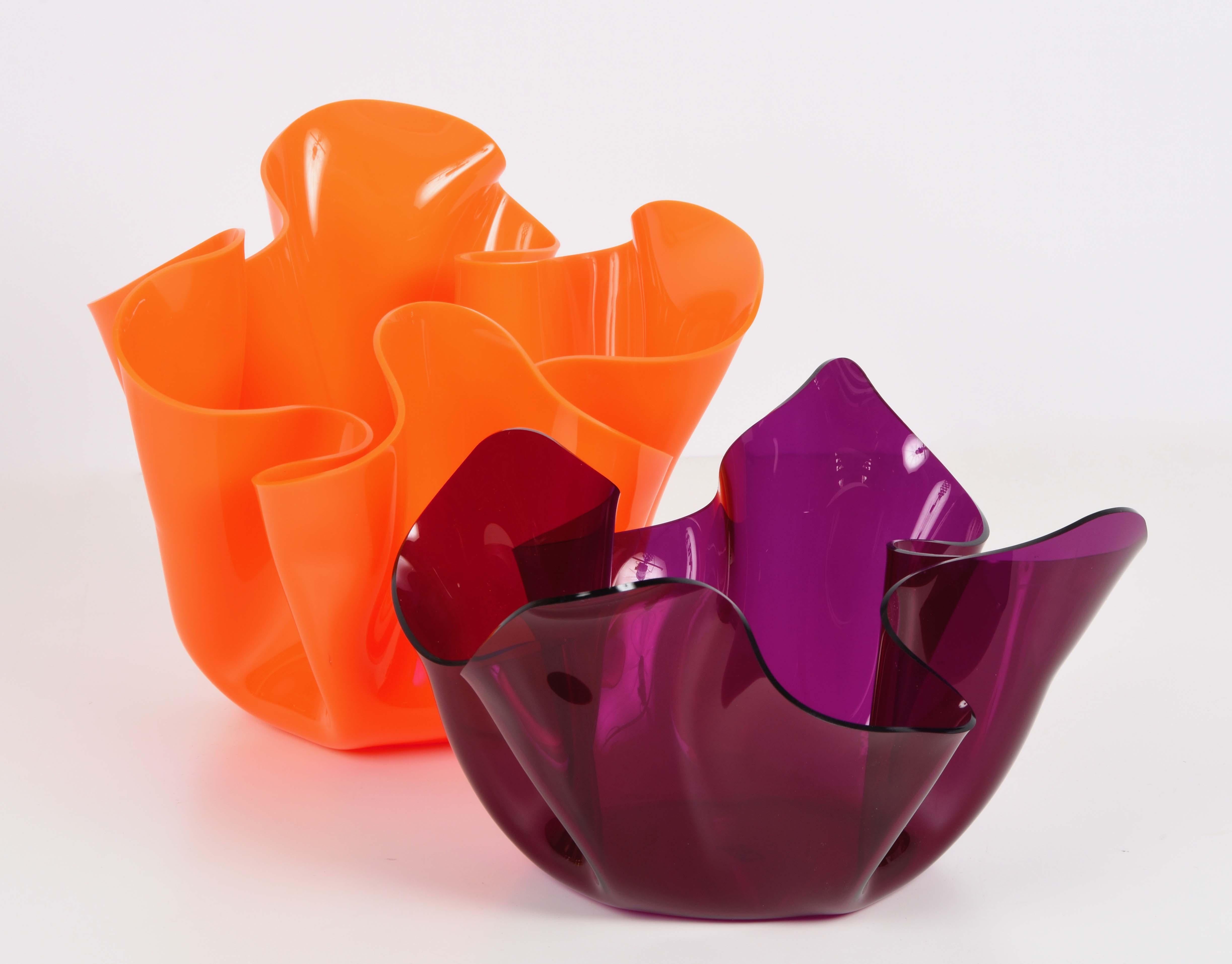 Pair of unique centerpieces in Lucite and plexiglass with original orange and purple shades. These amazing items were produced in Italy during 1970s by Guzzini, the most representative Italian brand for homeware.

These midcentury centerpieces