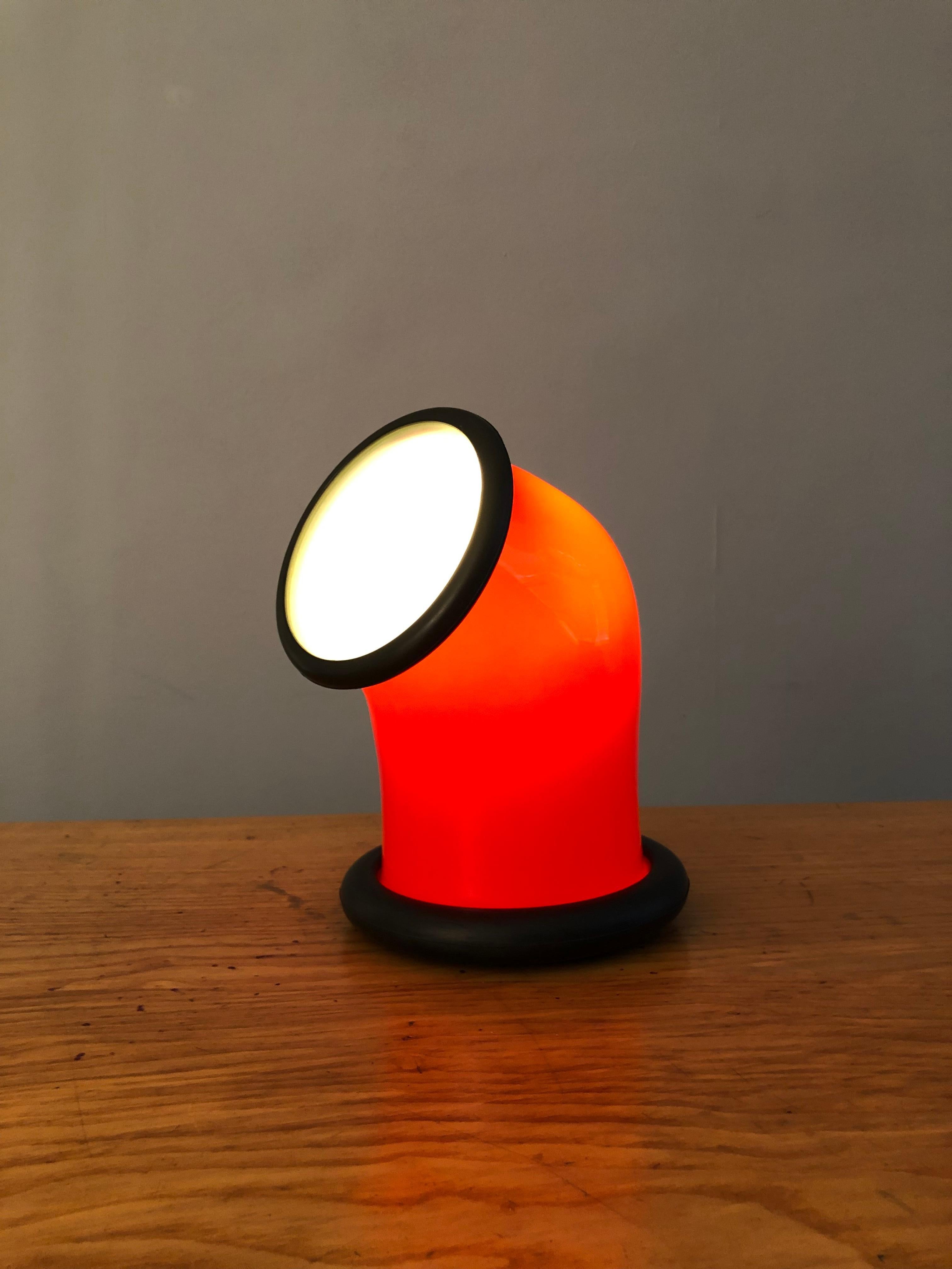 A wonderful pair of bright red Midcentury Holmegaard glass Epoke 1 lamps. Designed by Michael Bang for Holmegaard, Denmark, 1972. Delightful playful design and slightly nautical in nature.
Multipurpose usage - as designed. Fully rewired table lamp -