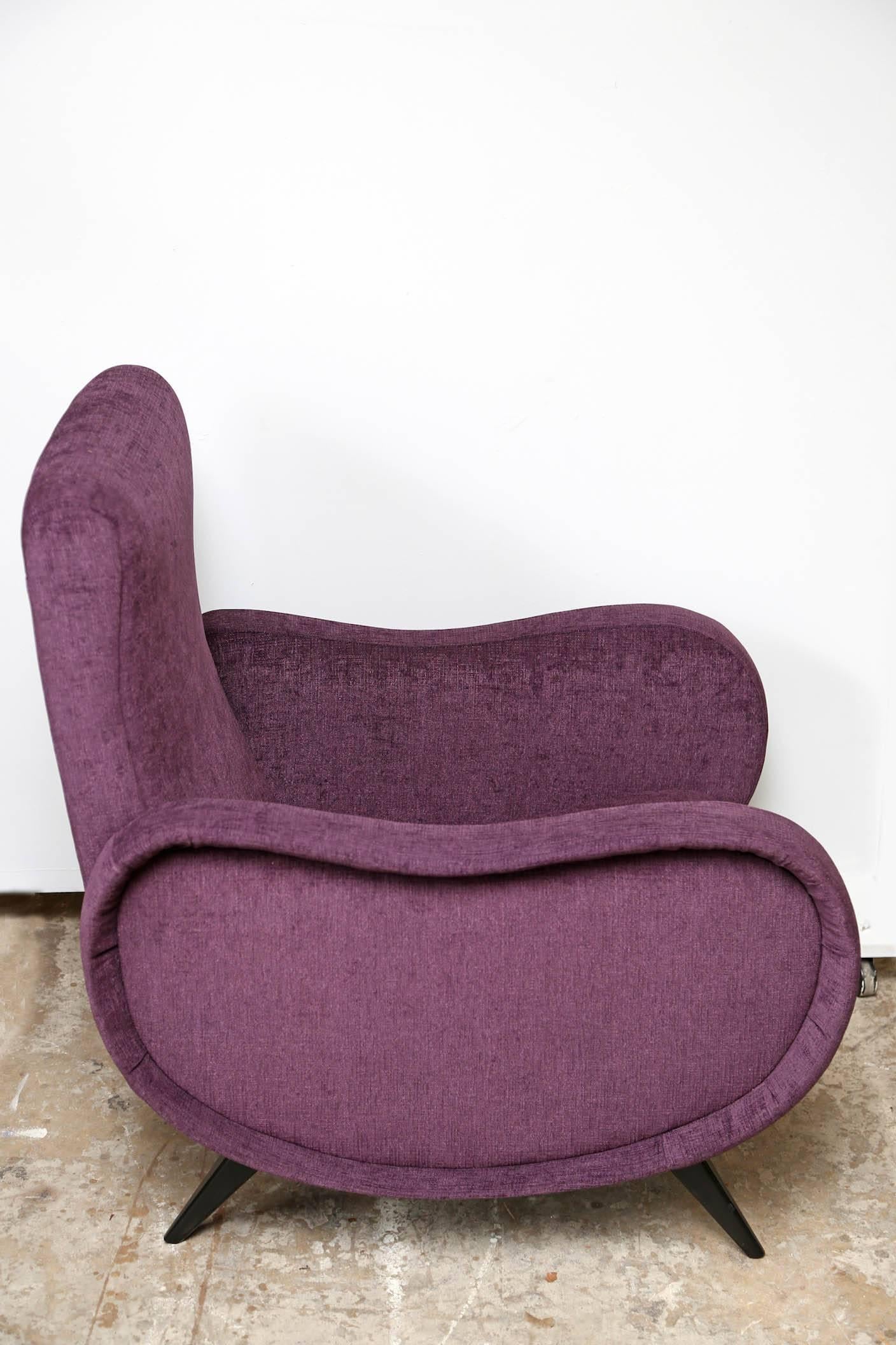 Italian midcentury recently refinished armchairs 
In the style of the Marco Zanuso Lady chair,
soft plum velvet fabric, very comfortable seats, elegant design.