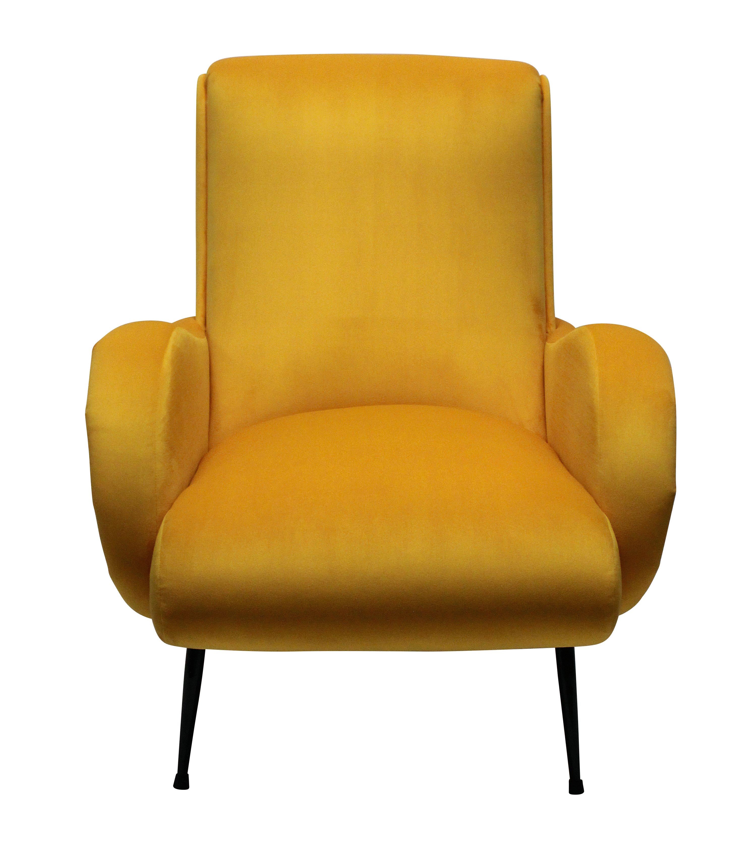 A pair of stylish and comfortable Italian midcentury armchairs, newly upholstered in warm yellow velvet.