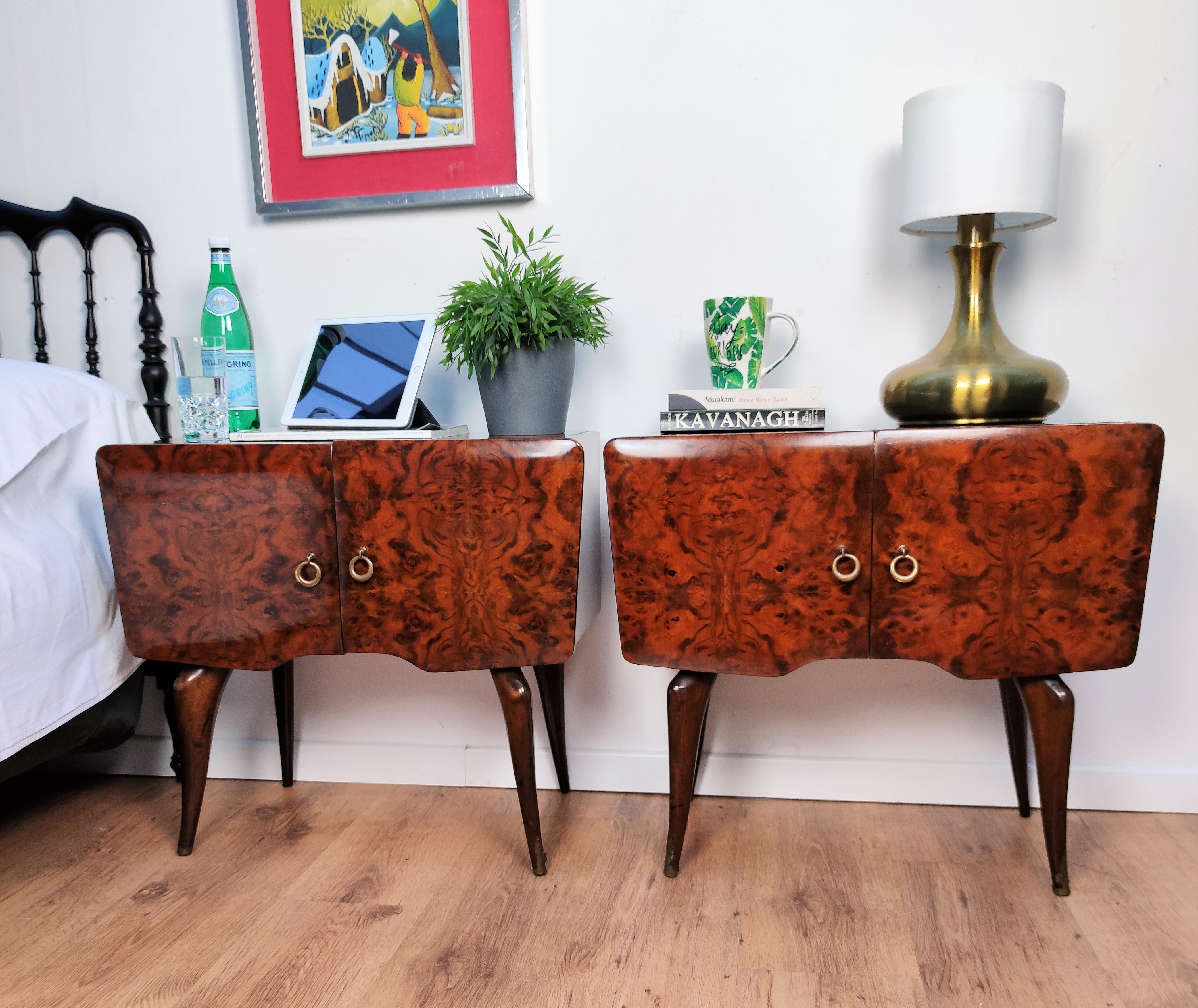Very elegant and refined Italian 1950s Mid-Century Modern, neoclassical, in typical Art Deco design, pair of bedside tables with burl walnut briar wood double front door, black lacquered glass top and brass details such as the handles and the foot