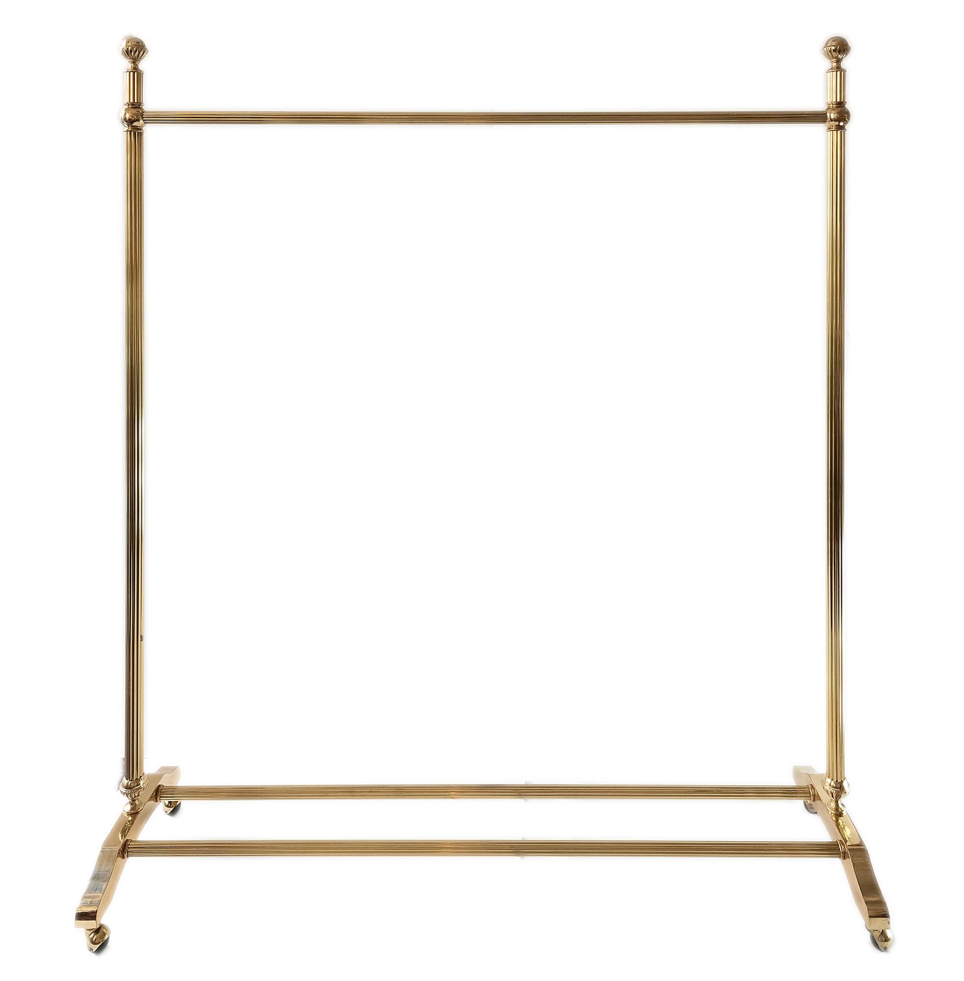 Italian coat / clothes racks stands are made of polished brass. 
The base in on wheels.
For delivery can be disassembled.