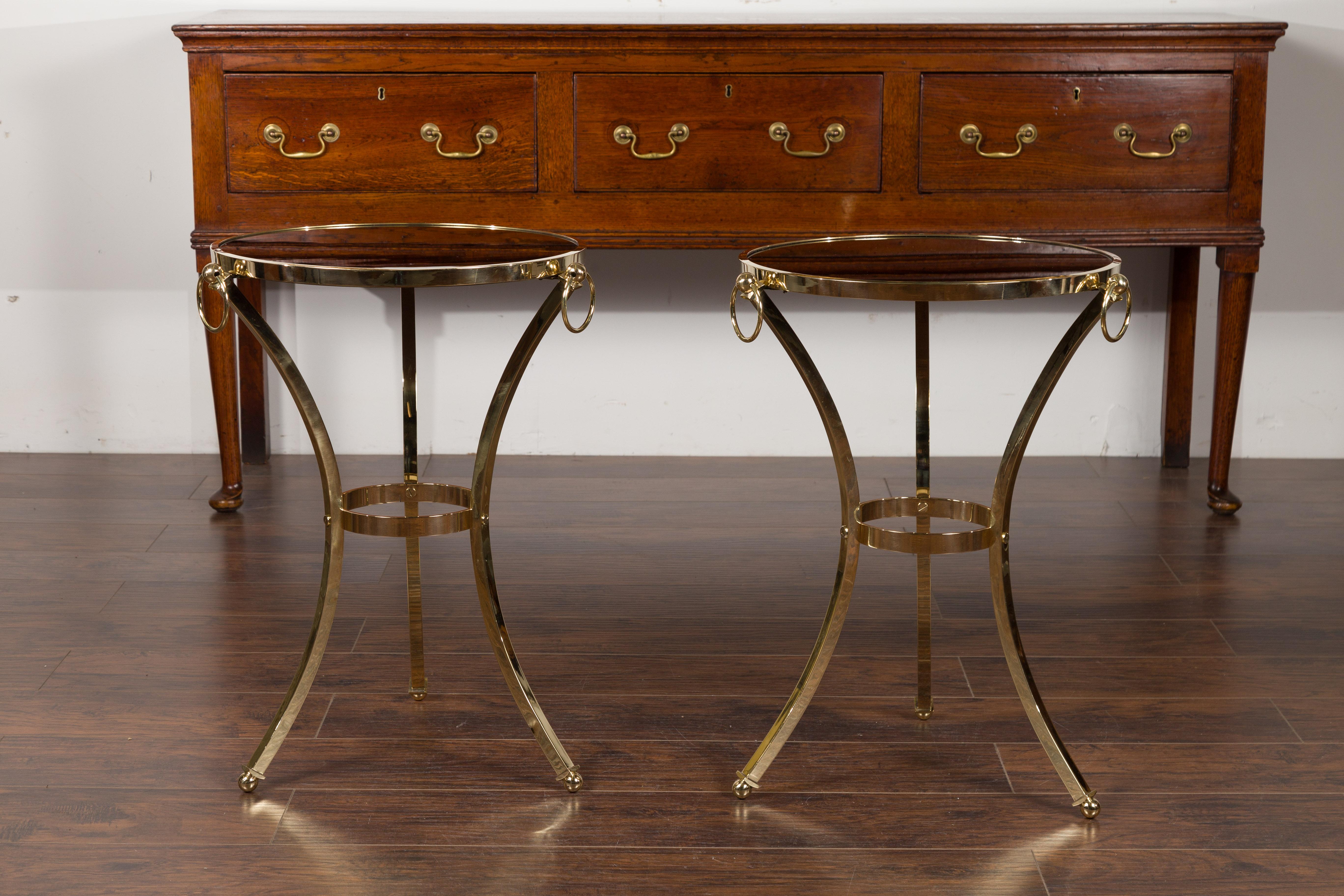 Pair of Midcentury Italian Brass Tables with Black Mirrored Tops and Ring Motifs In Good Condition For Sale In Atlanta, GA