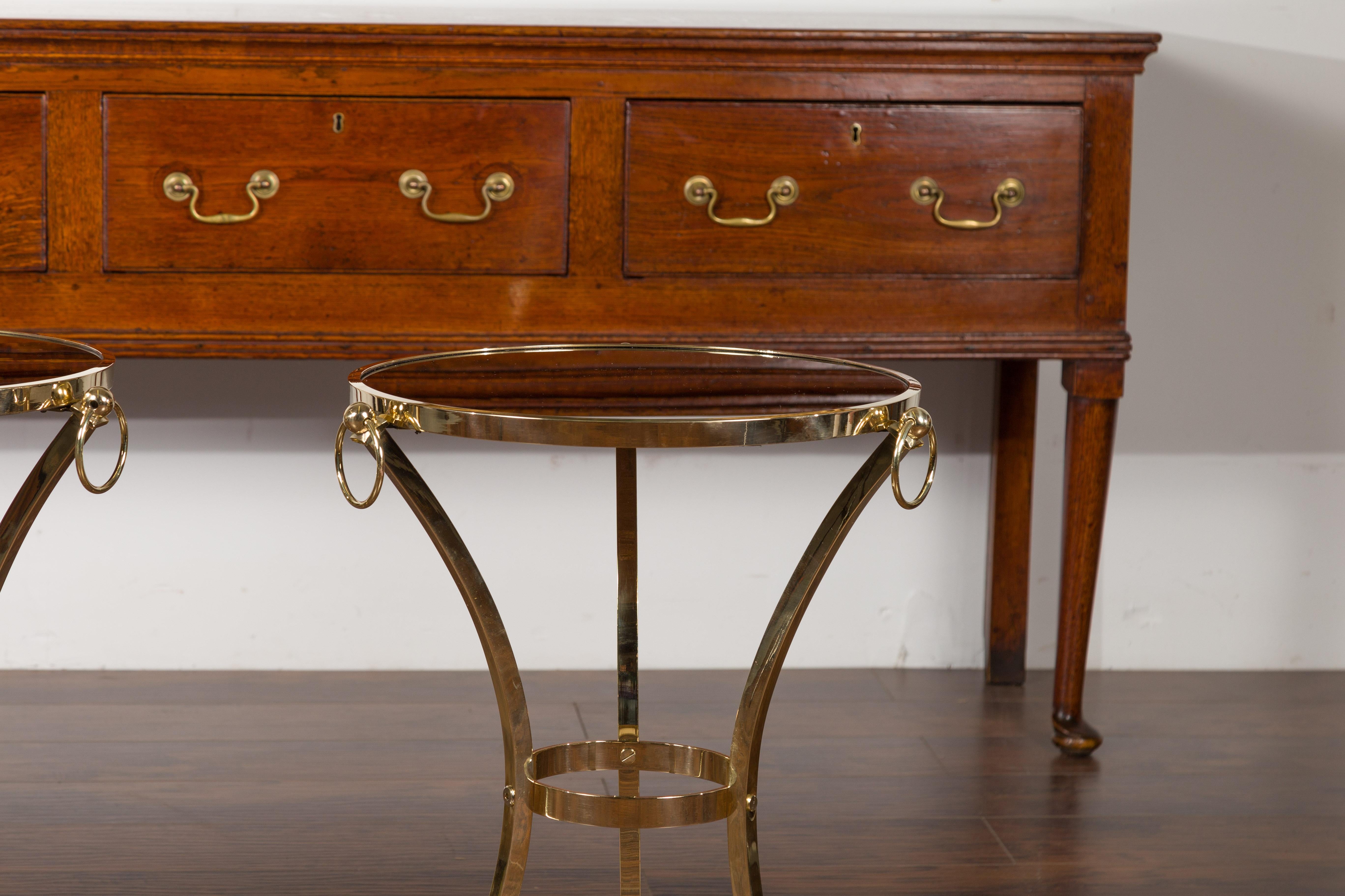 Pair of Midcentury Italian Brass Tables with Black Mirrored Tops and Ring Motifs For Sale 1