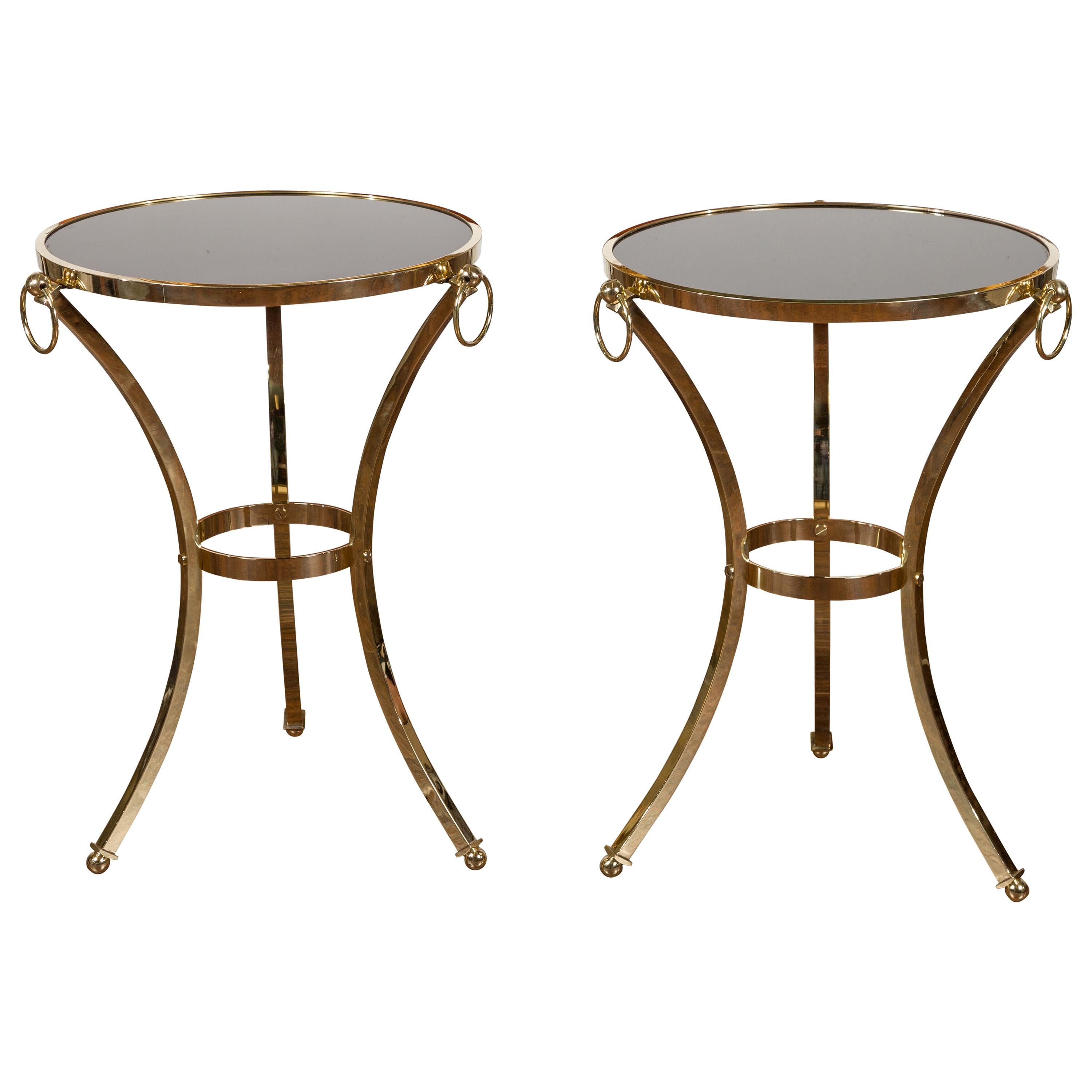Pair of Midcentury Italian Brass Tables with Black Mirrored Tops and Ring Motifs For Sale