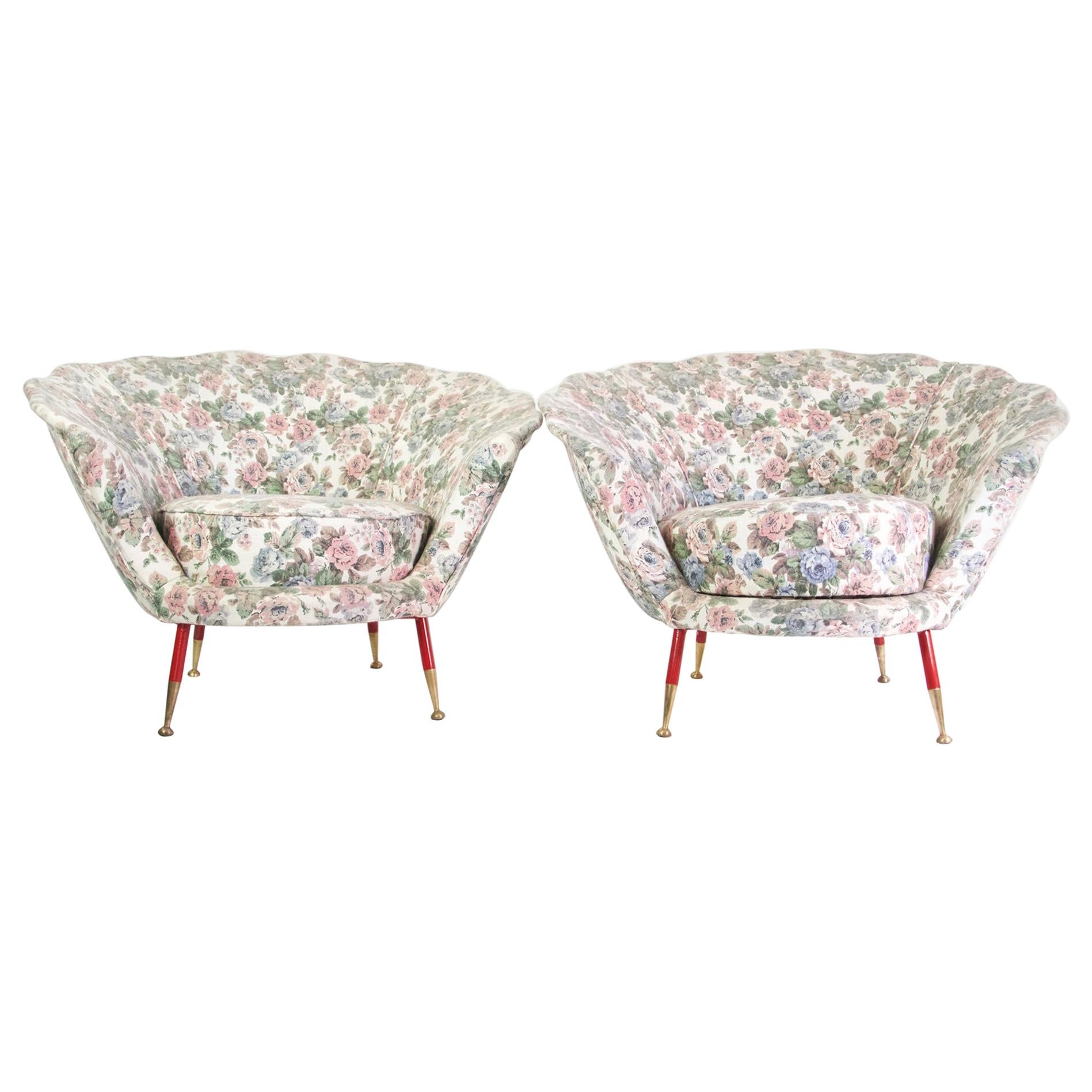 A pair of elegant Italian armchairs from circa 1950. The chairs are in good solid condition but are in need of reupholstery.
