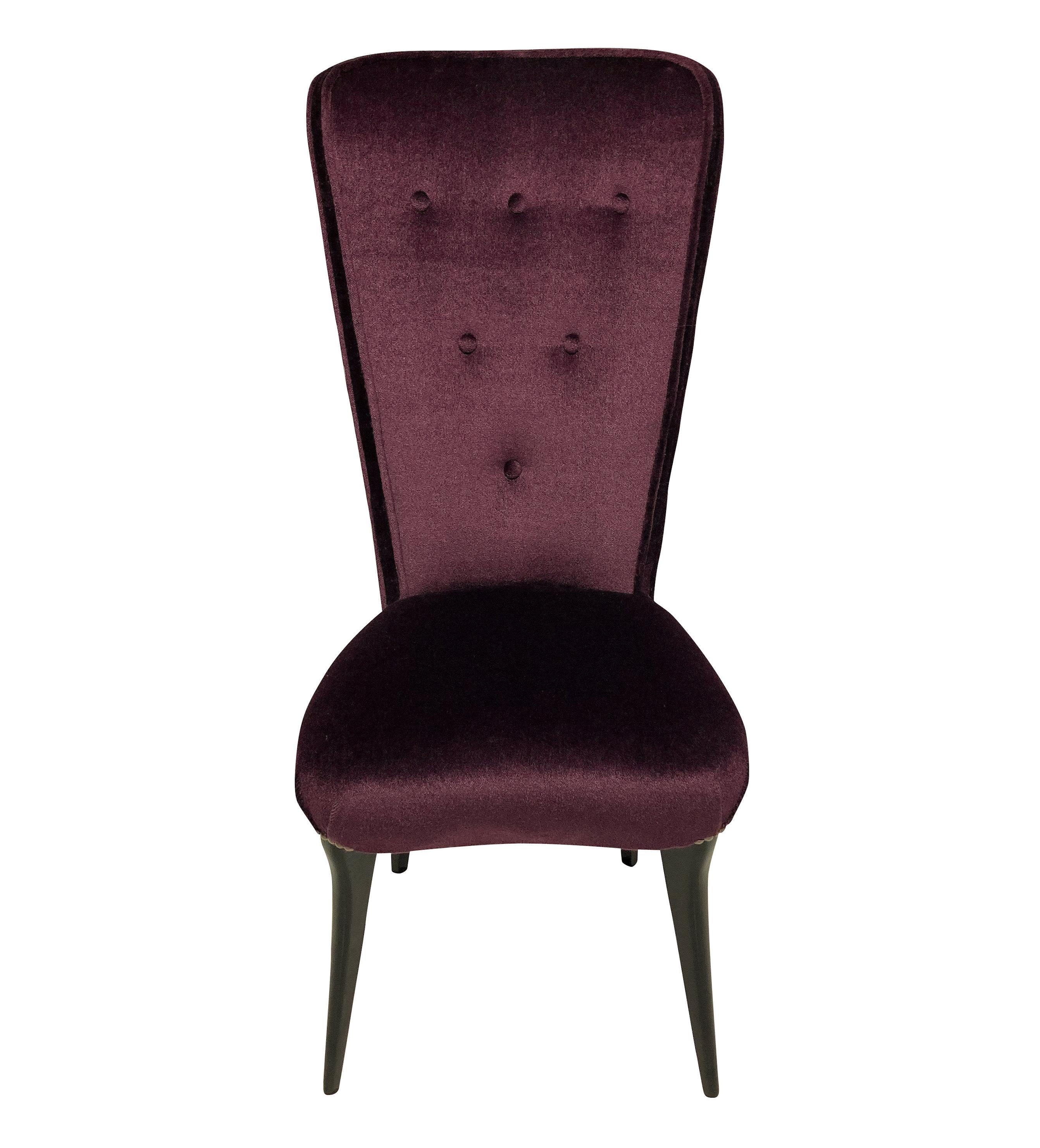 A pair of stylish Italian hall chairs with high buttoned backs and ebonized legs. Newly upholstered in aubergine mohair velvet.