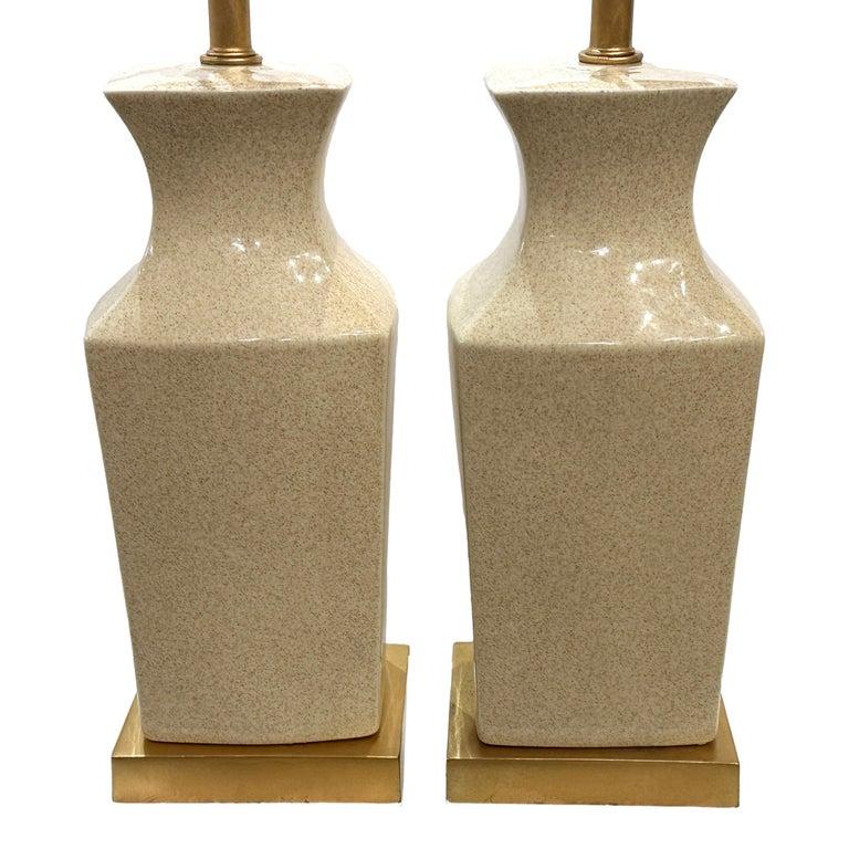 Pair of circa 1950's Italian porcelain lamps with gilt bases.

Measurements:
Height of body: 18